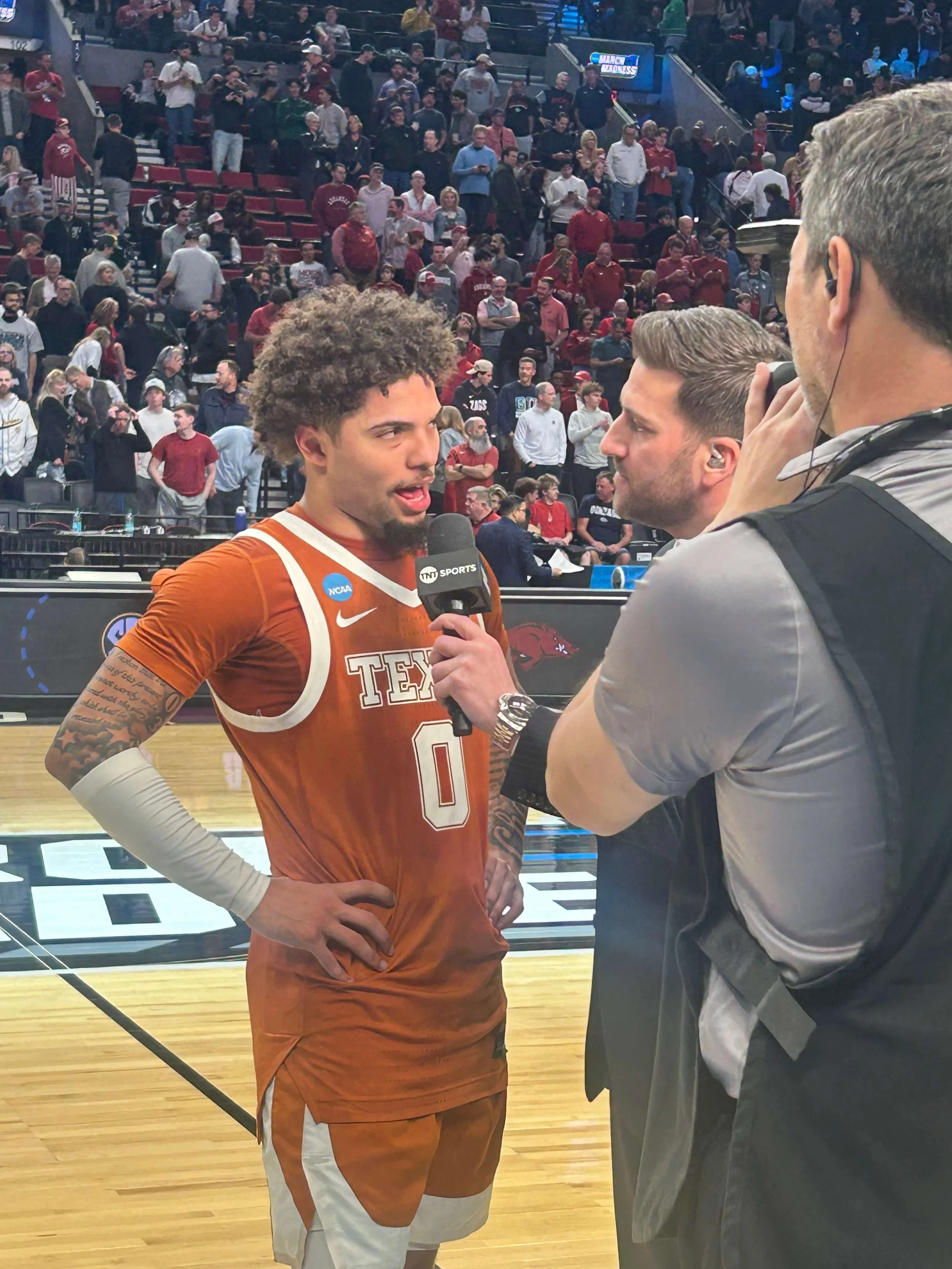 Ex-Beaver Pope is interviewed after his lead role in getting the Longhorns to the Sweet Sixteen