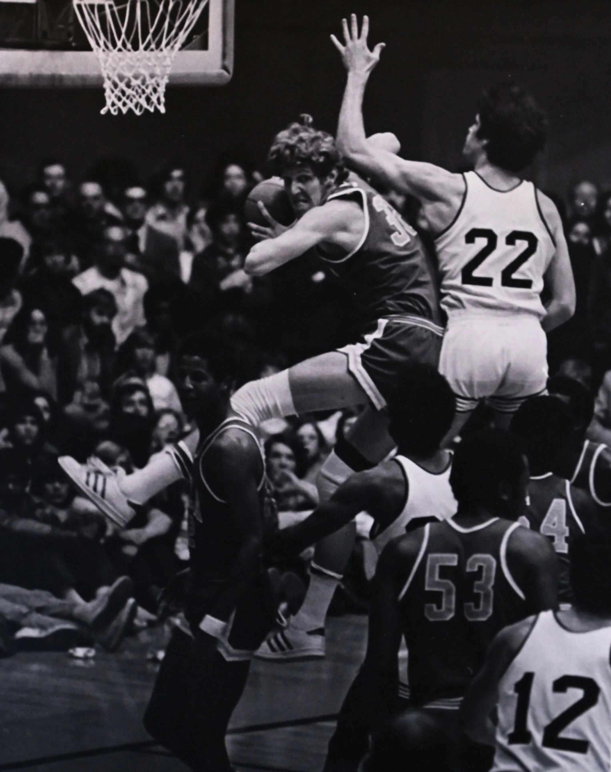 UCLA’s Bill Walton means business as he snares a rebound away from OSU’s Neil Jurgenson in at Gill in 1973 (courtesy Dave Nishitani)