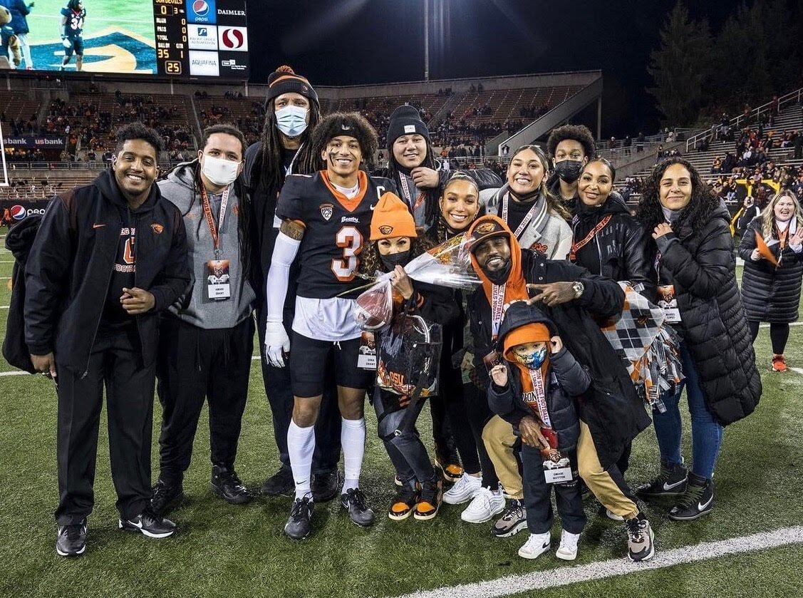  Most of the Grant/Wonder clan pose with Jaydon after a Beaver victory at Reser Stadium (courtesy Gina Wonder) 