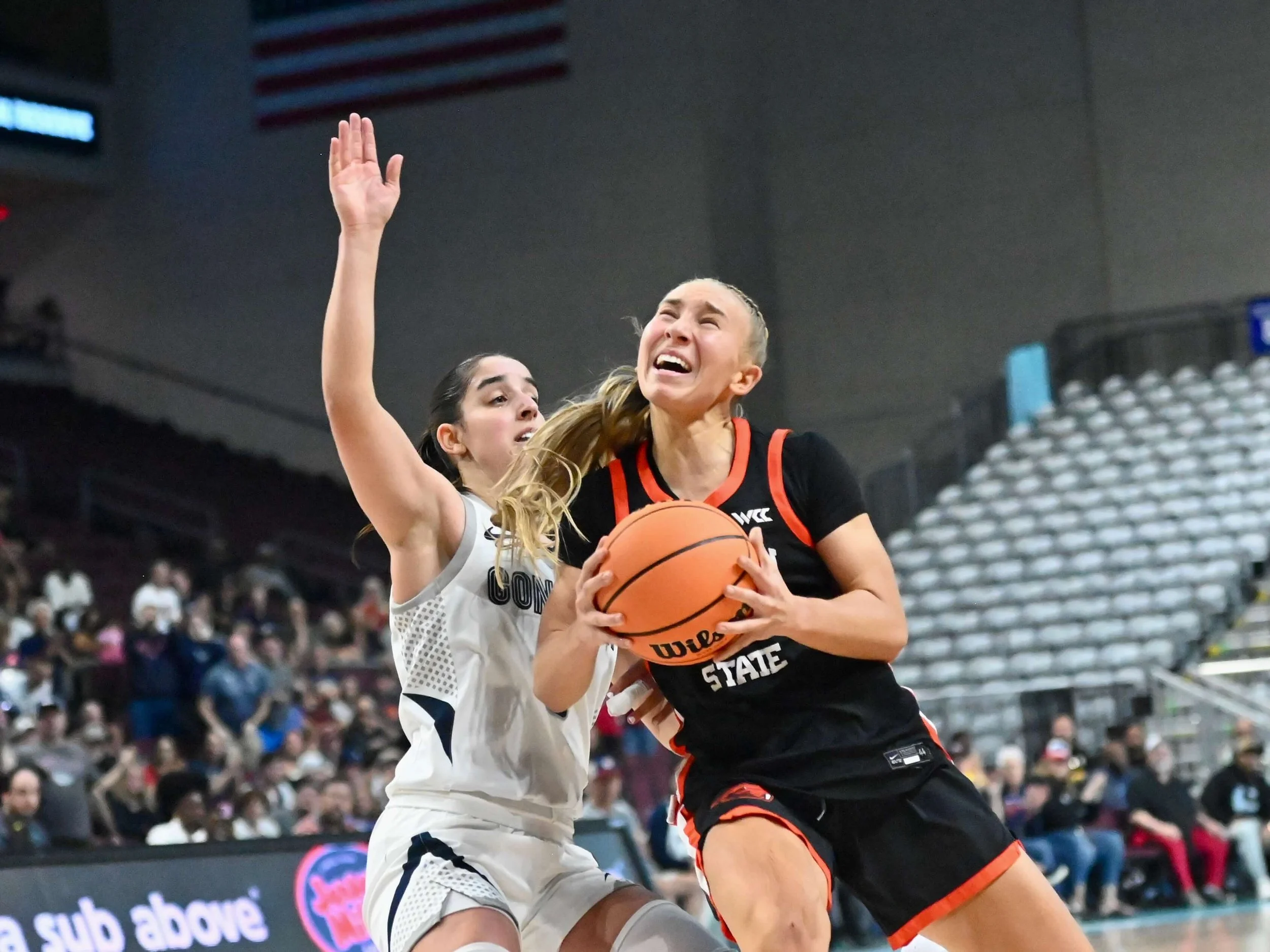 Point guard Kennedie Shuler muscles to the basket against Gonzaga in 2026 (courtesy Dominic Cusimano)