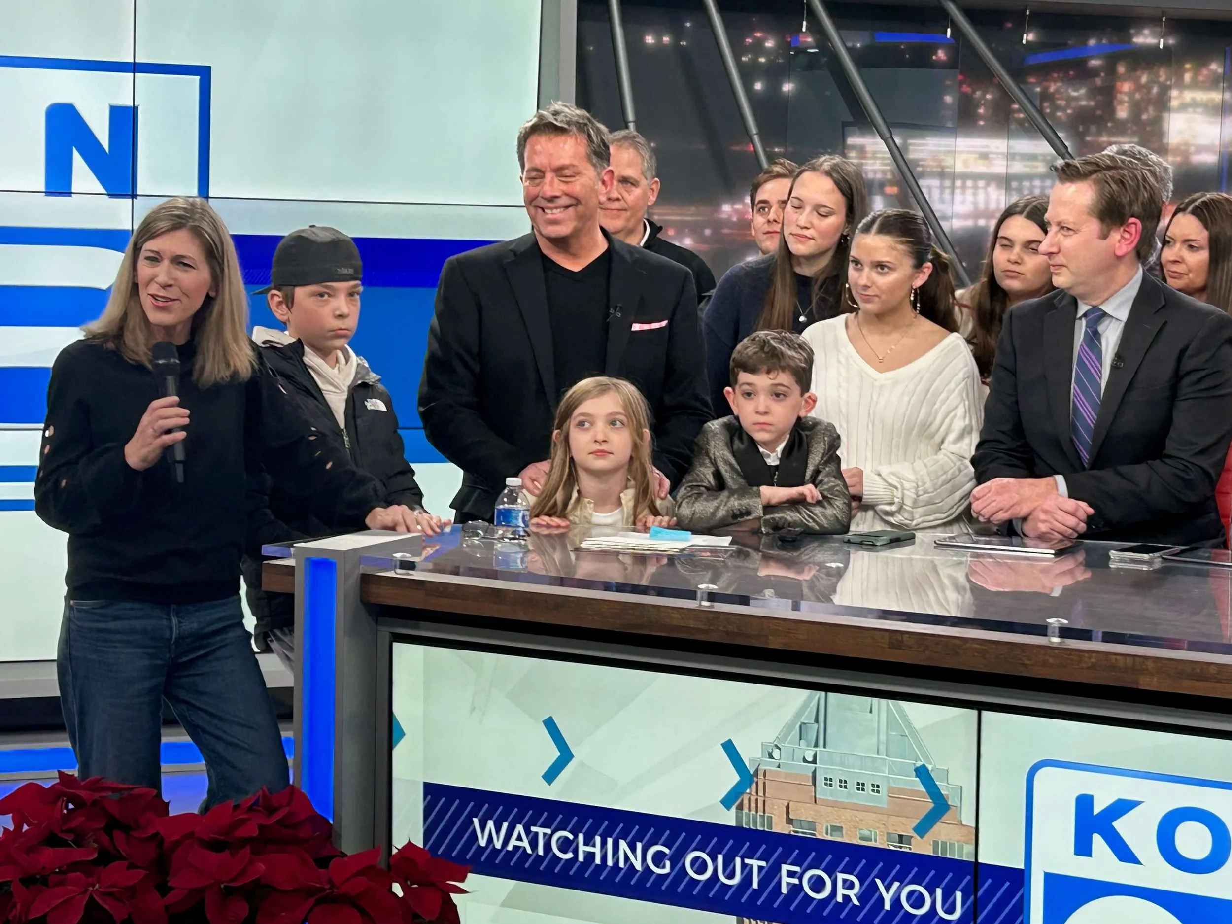 Adam Bjaranson, here with wife Lindsay (left) and their three children during his final telecast at KOIN, is enjoying retirement from the sportscasting profession (courtesy Adam Bjaranson)