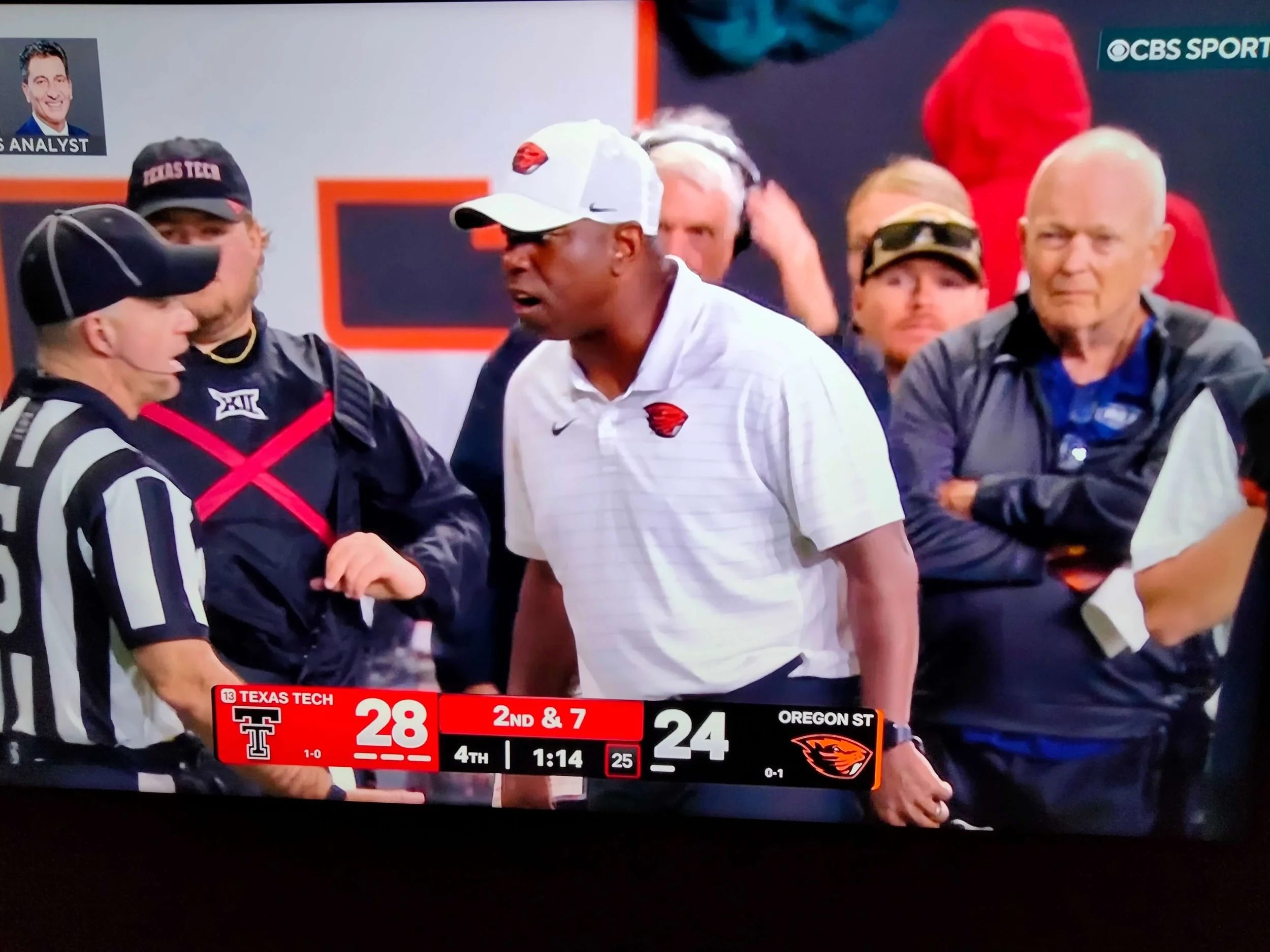 A veteran member of the Fourth Estate (right) looks on as coach JaMarcus Shephard gives a mouthful to a referee late in Oregon State’s loss to Texas Tech