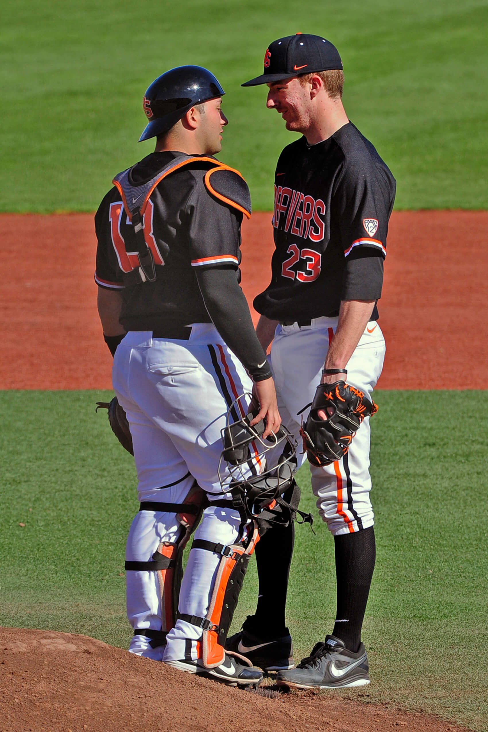 Andrew-Moore, here with catcher Jake Rodriguez in 2013, says “all roles are on the table” with his pitching staff in 2027 (courtesy Dave Nishitani)