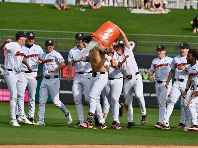 Teammates douse freshman left-fielder Josh Proctor with Gatorade shower after his walk-off single provided Oregon State with a 3-2 win over Stanford Sunday at Surprise Stadium (courtesy Dominic Cusimano)