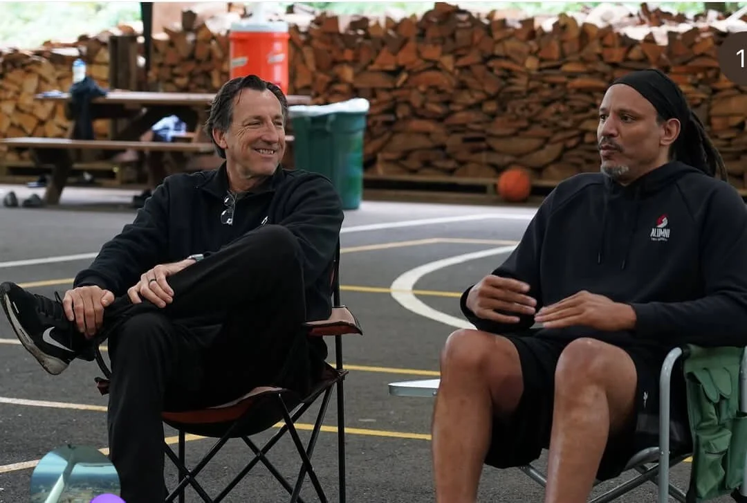 Dudley, shown here with ex-Blazer forward Brian Grant, says he is optimistic a deal will get done between Dundon and the city, county and state (courtesy Dudley family)