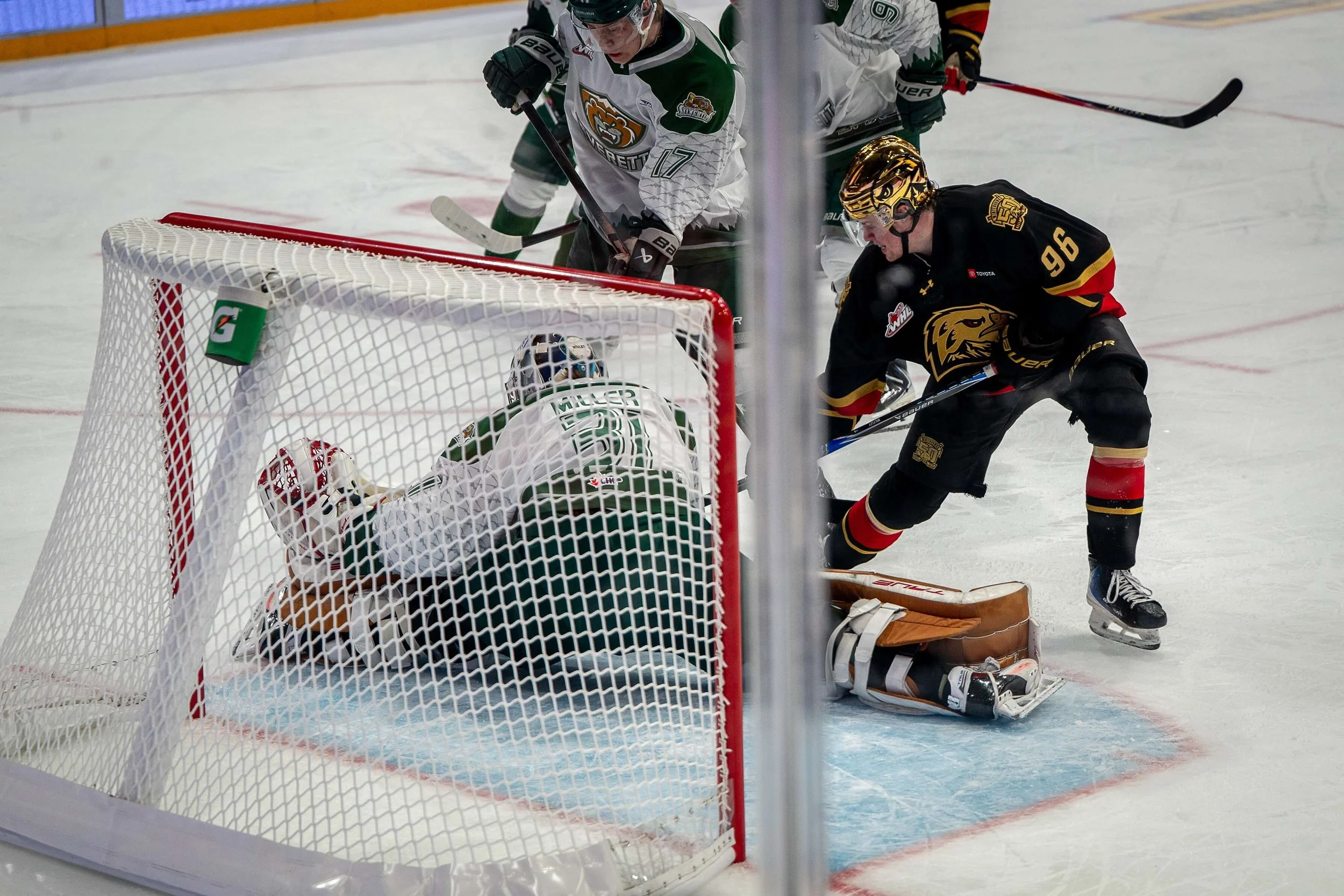 Nathan Free beats Everett goaltender Anders Miller for a first-period goal, his third of the playoffs, but the Silvertips prevailed 6-3 (courtesy Winterhawks/Brian Hoven)