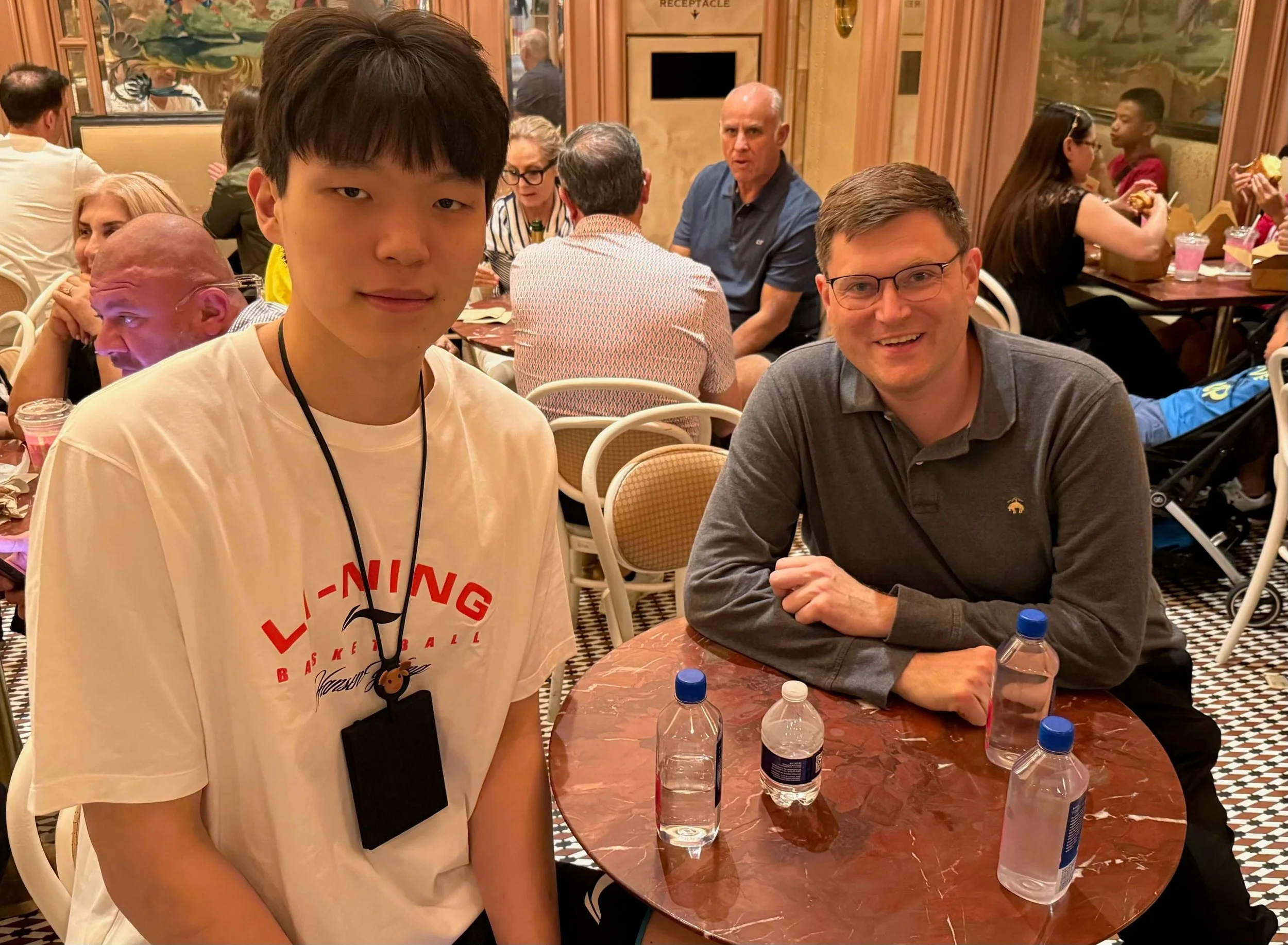 Former Portland sportswriter Ben Golliver (right), shown with Trail Blazer rookie Yang Hansen during the 2025 Las Vegas Summer League, was a victim of the Washington Post’s layoff of its entire sports staff (courtesy Ben Golliver)