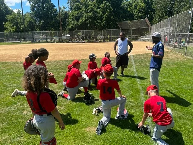 Monarchs coach Mario Appling talks with his players after their game against The Rads of Washougal, Wash. (courtesy Antonio Harris)