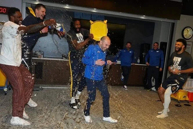 David Adelman, shown celebrating his first head coaching victory with the Denver Nuggets in 2023, had his first career ejection last Saturday in a loss to Houston