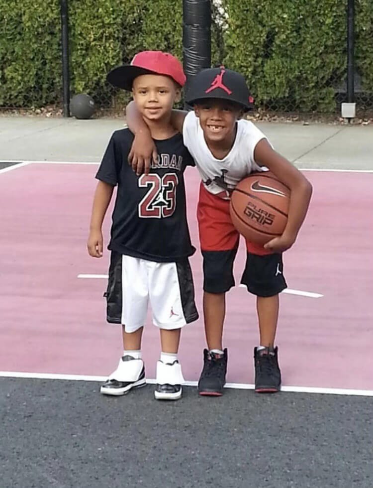 Jemai (left) and JoJo were gym rats from a young age (courtesy Josiah Lake Sr.)