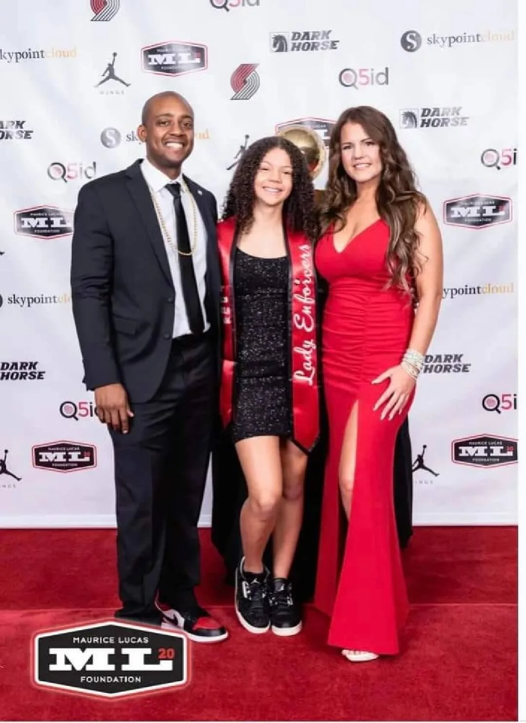 Love Lei Best, shown with parents Demarcus and Joy Best, plays her AAU ball with the ML20 Enforcers. Joy and Demarcus are her coaches (courtesy Demarcus Best)