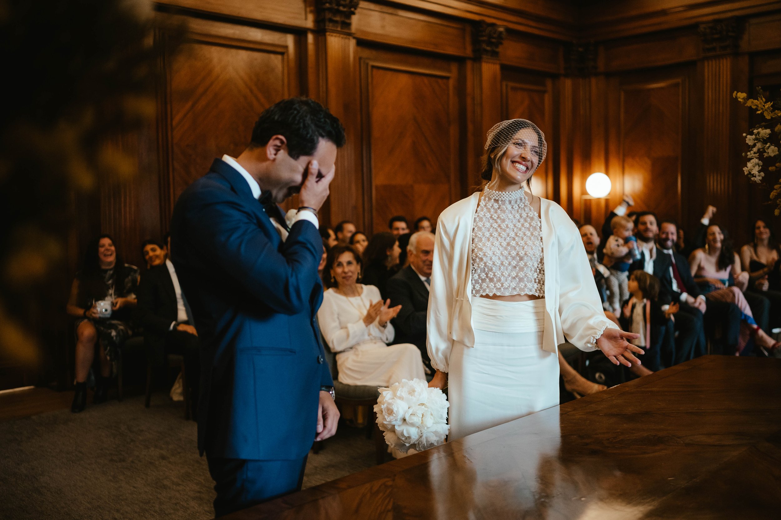 The vows - bride and groom at Marylebone Town Hall, Westminster Room