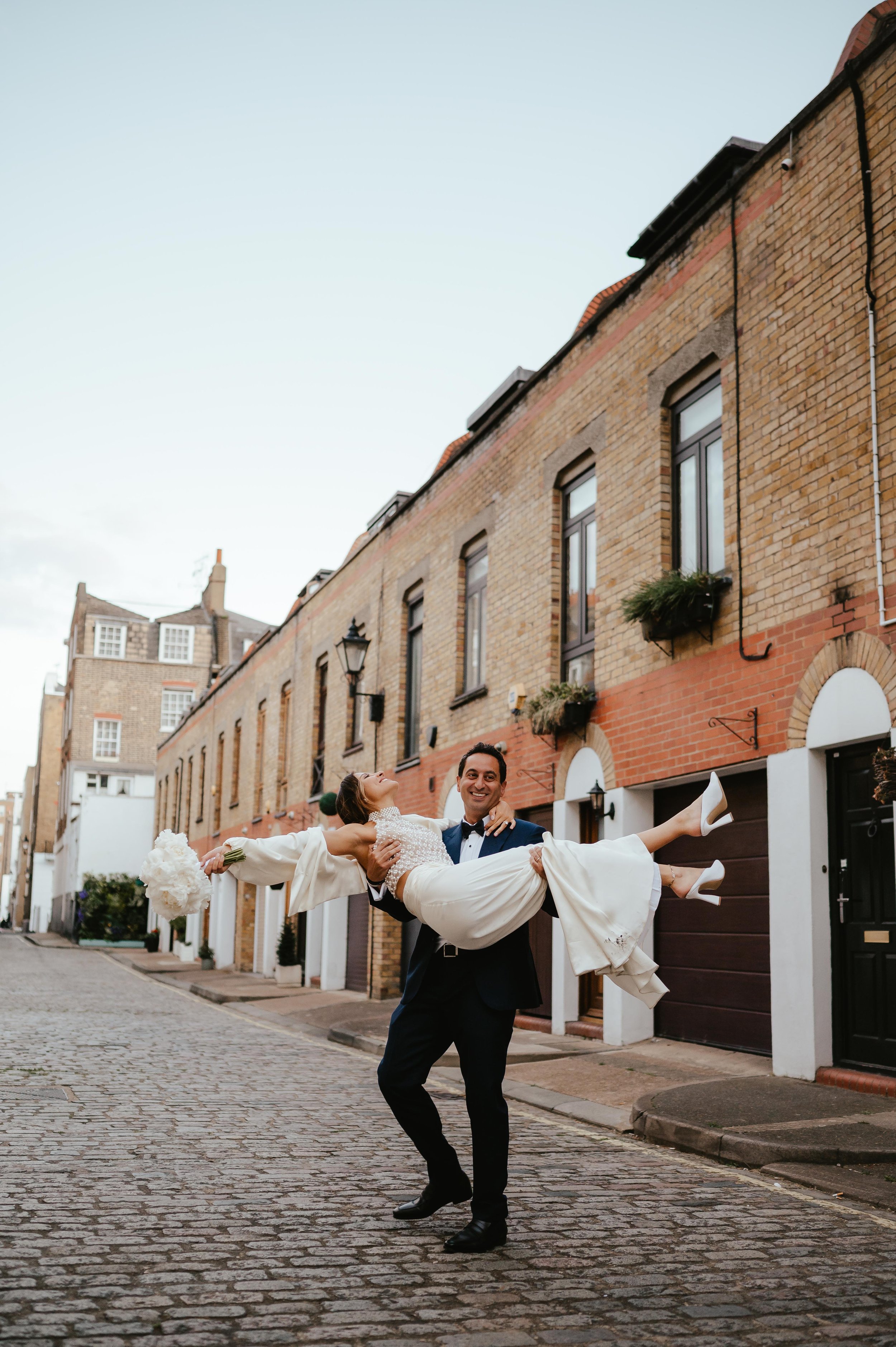 couples wedding portraits in London city wedding