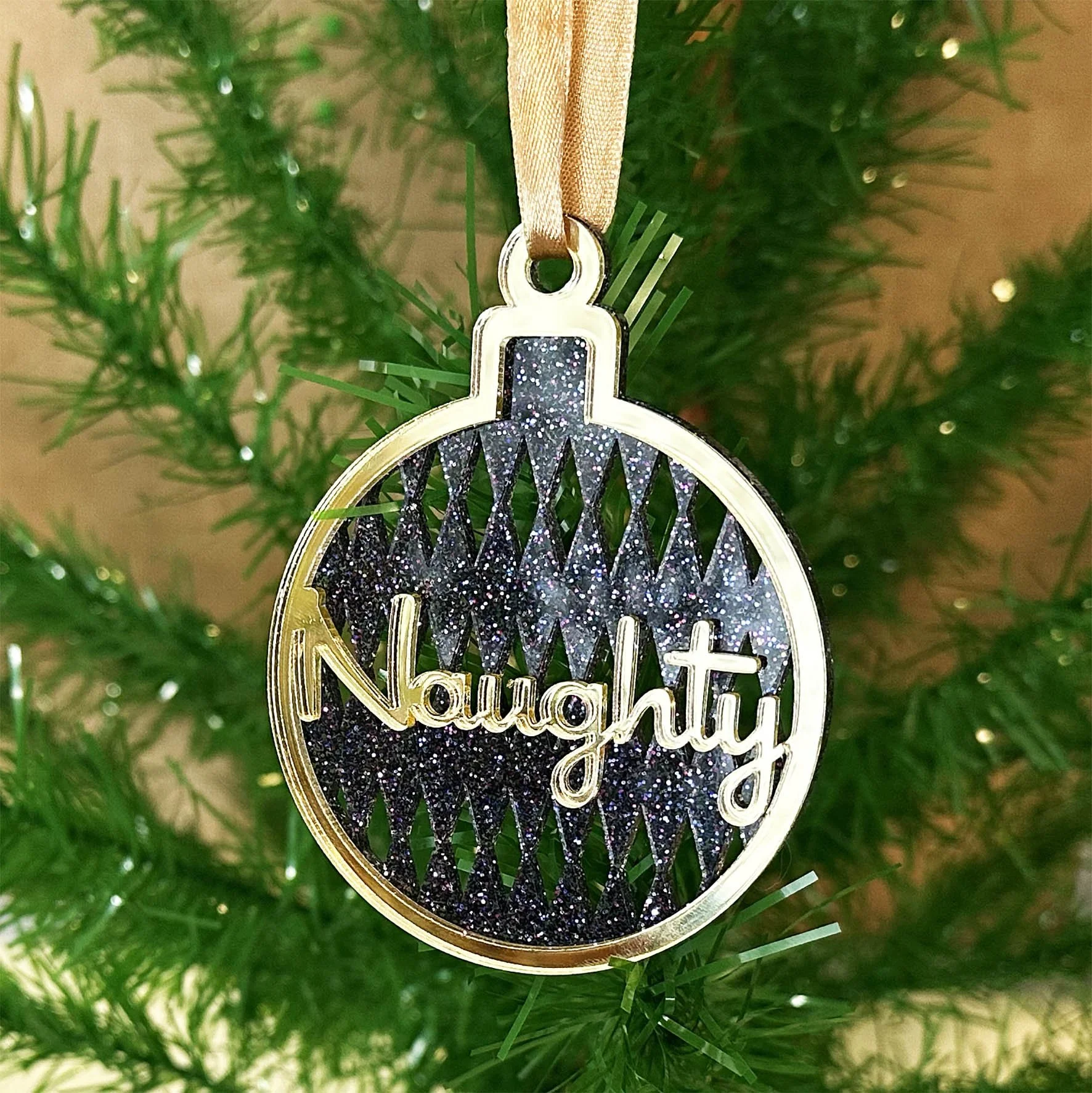 Xmas_bauble_naughty_gold_purpleA.jpg