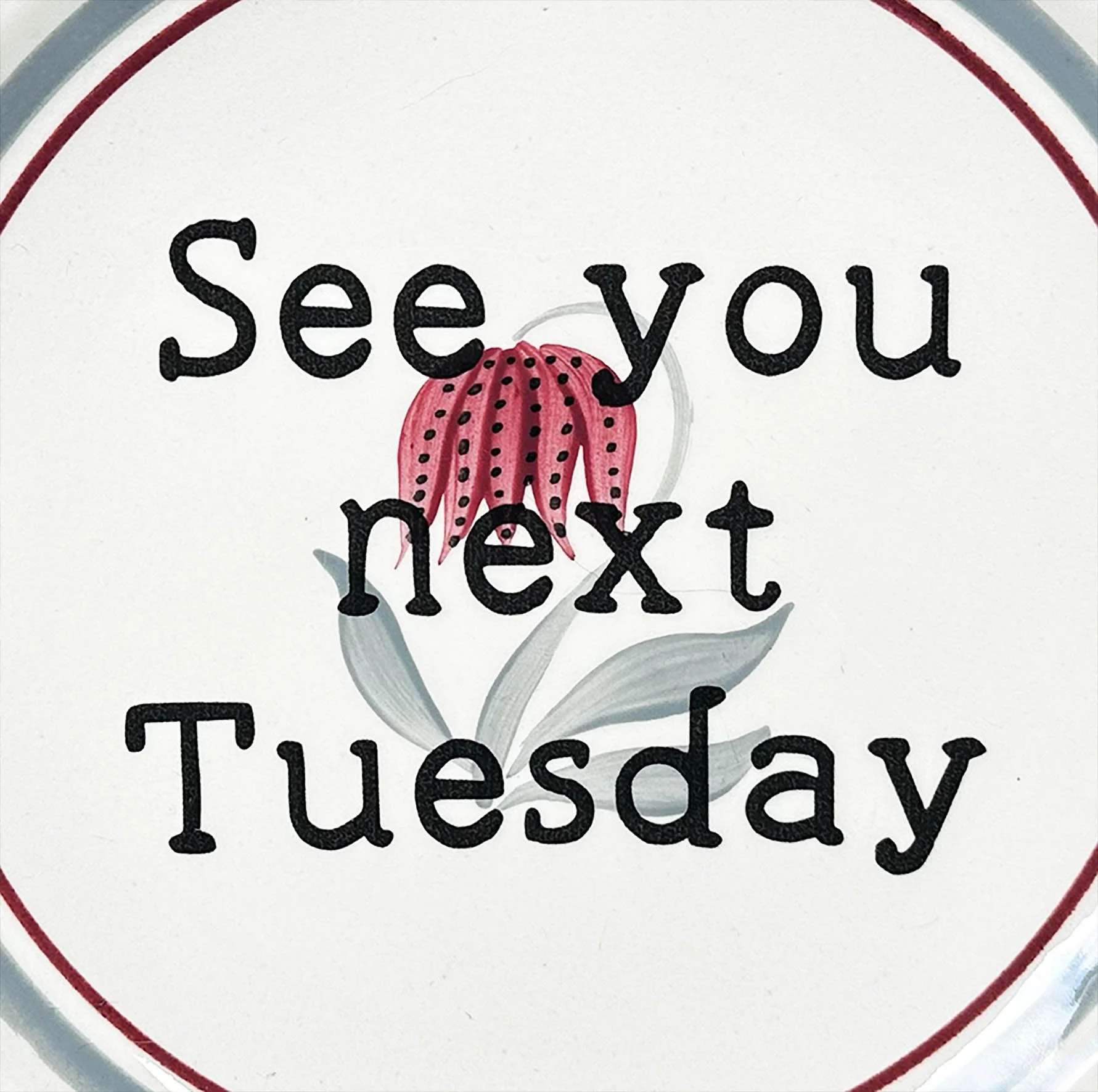 A vintage plate with a cheeky quote "see you next Tuesday"
