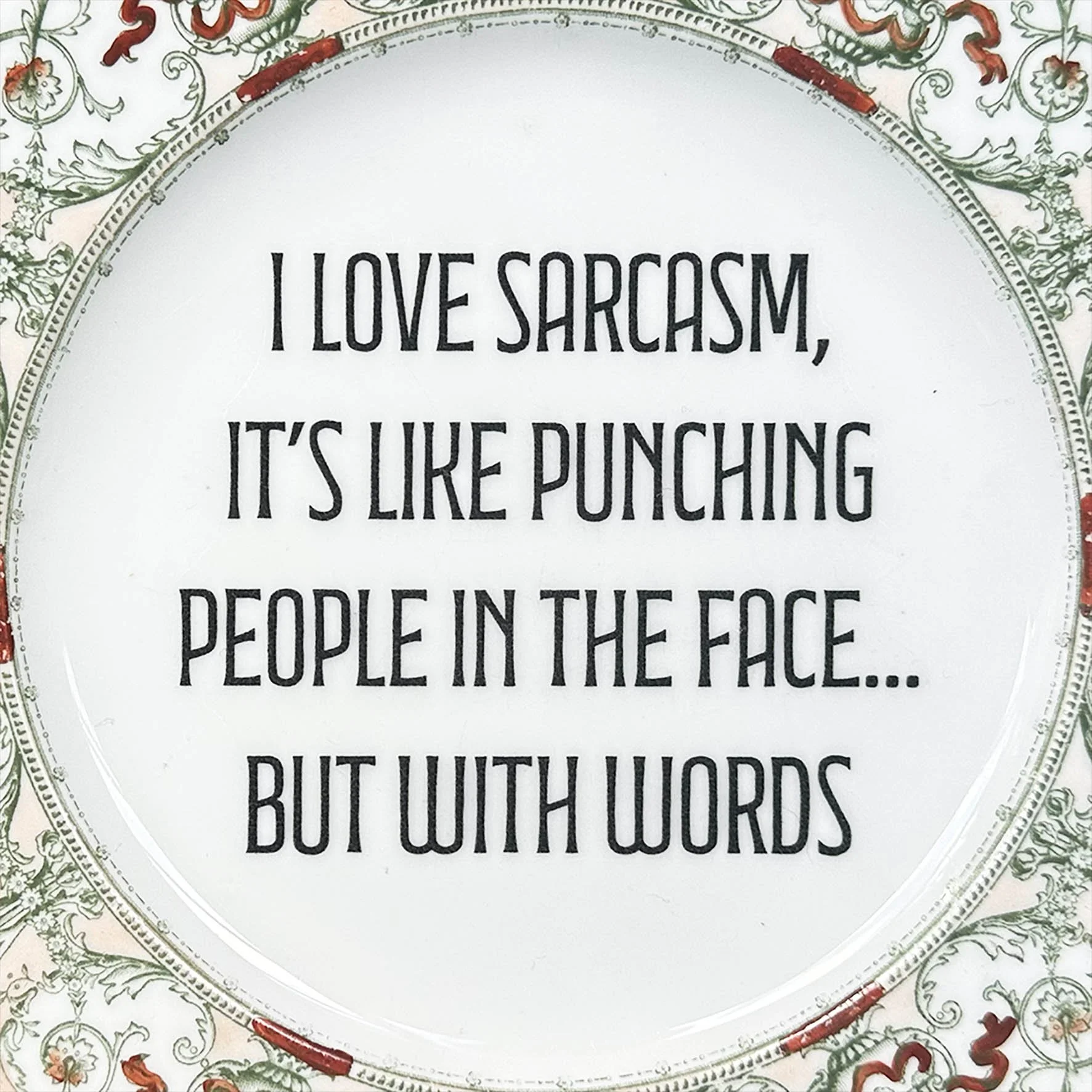 A vintage plate with a cheeky quote “I love sarcasm, it’s like punching people in the face…but with words”