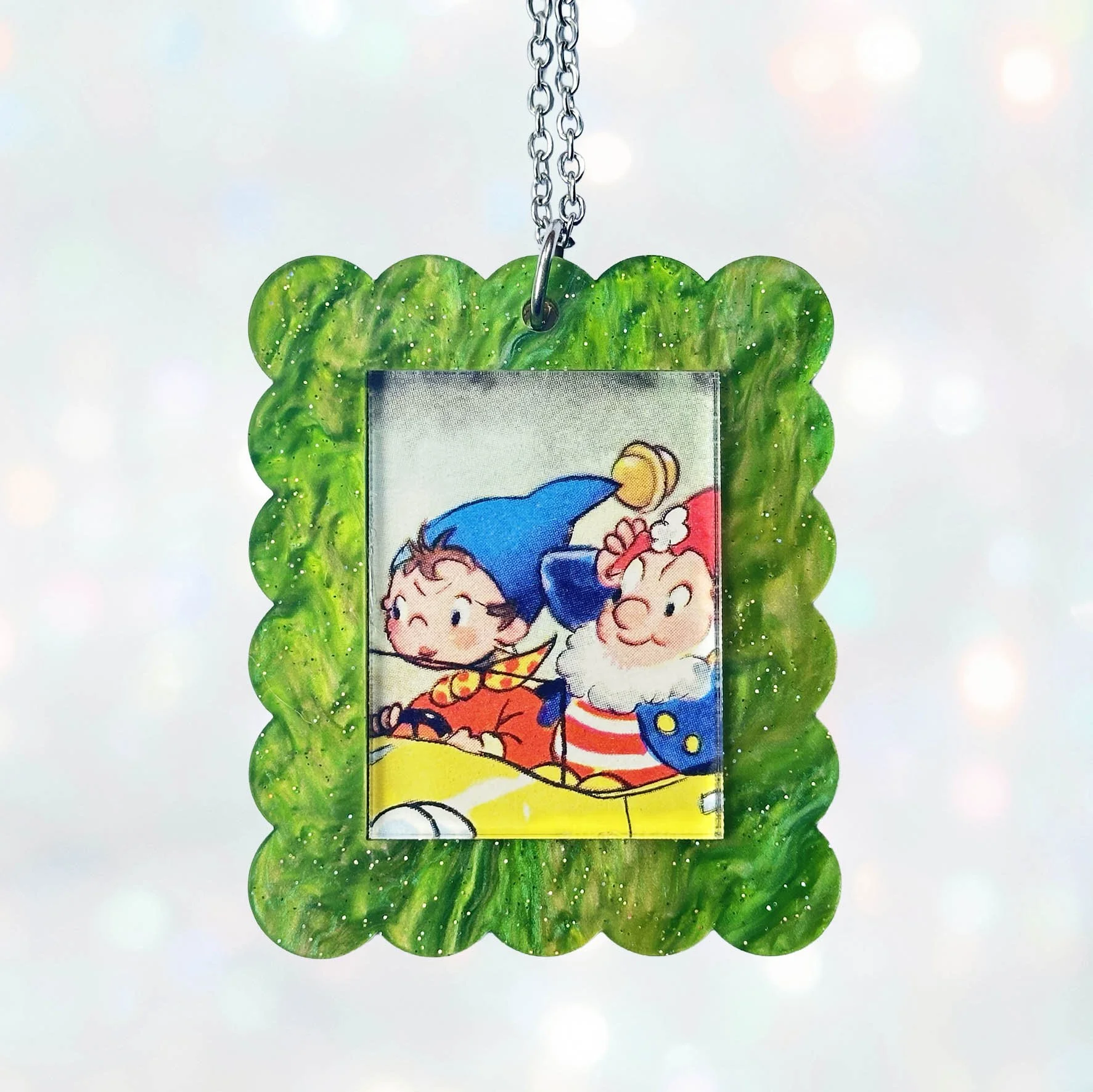 Green glitter acrylic rectangle necklace featuring a picture of Noddy