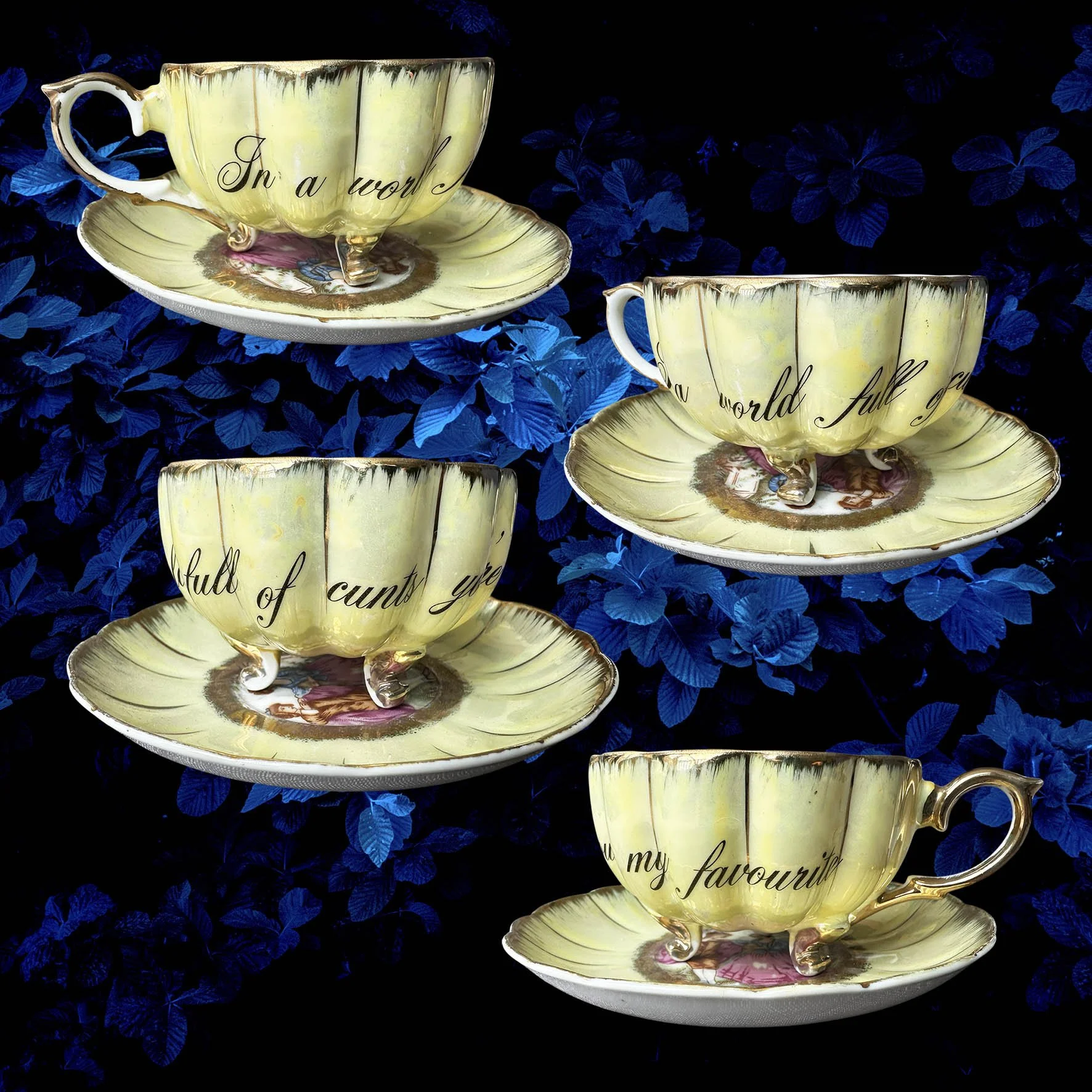 A yellow scalloped shaped tea cup with a picture of a couple and the words "In a world full of cunts you're my favourite"