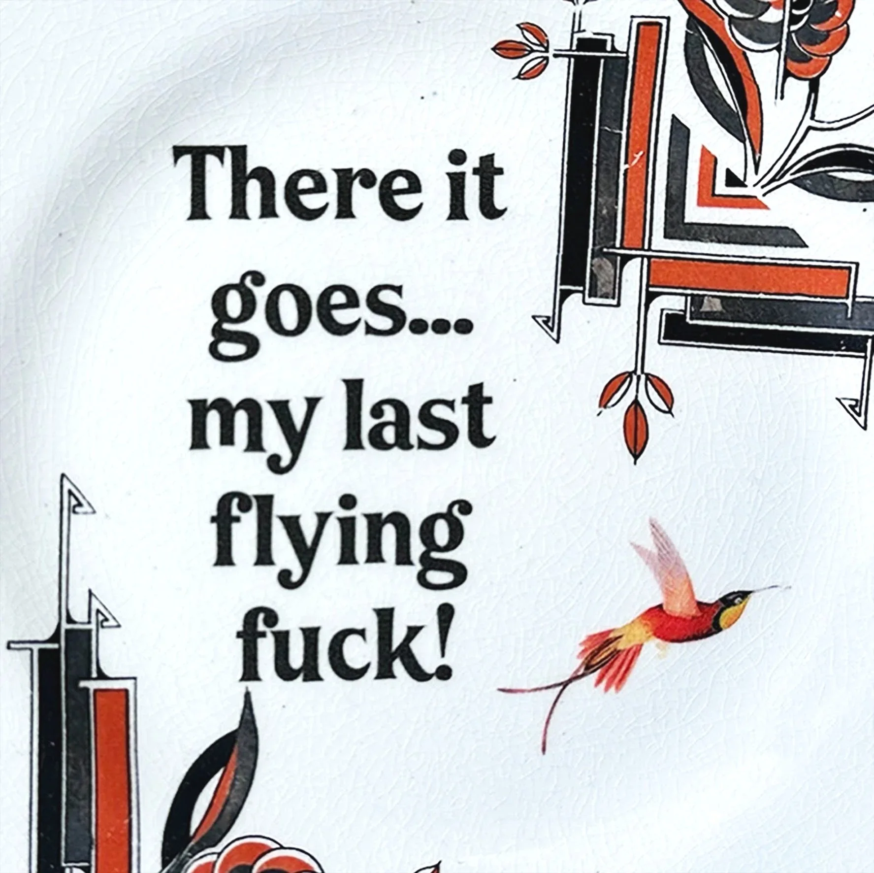 A vintage plate with a picture of a bird and the words "there it goes my last flying fuck!"