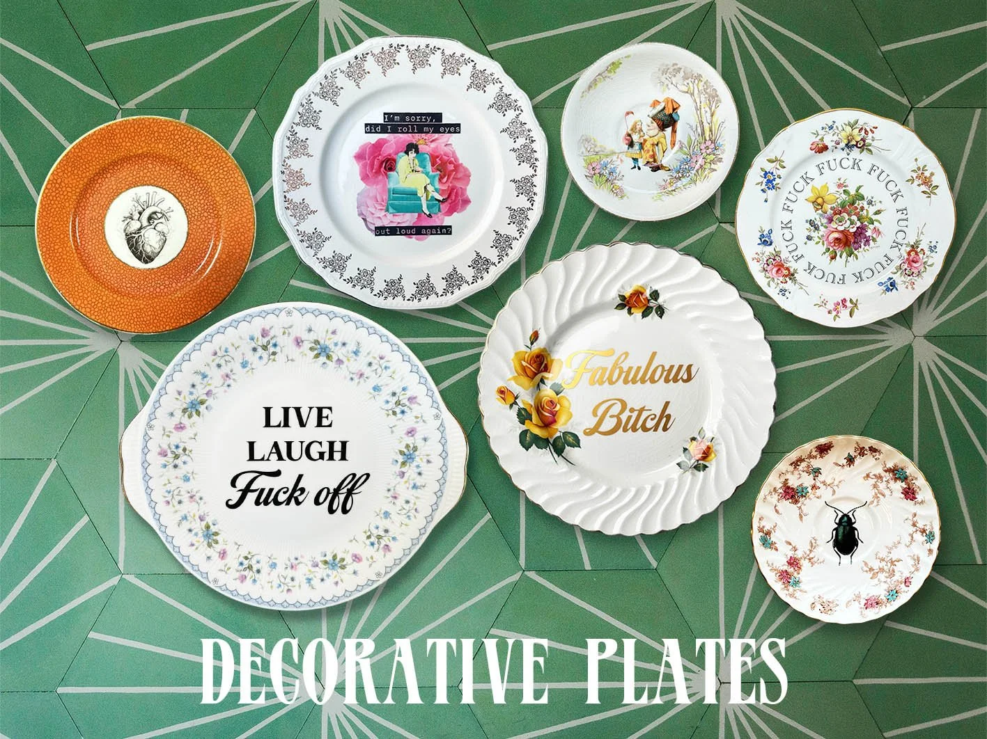 A collection of decorative plates with quotes displayed as a group on a green art deco style wall