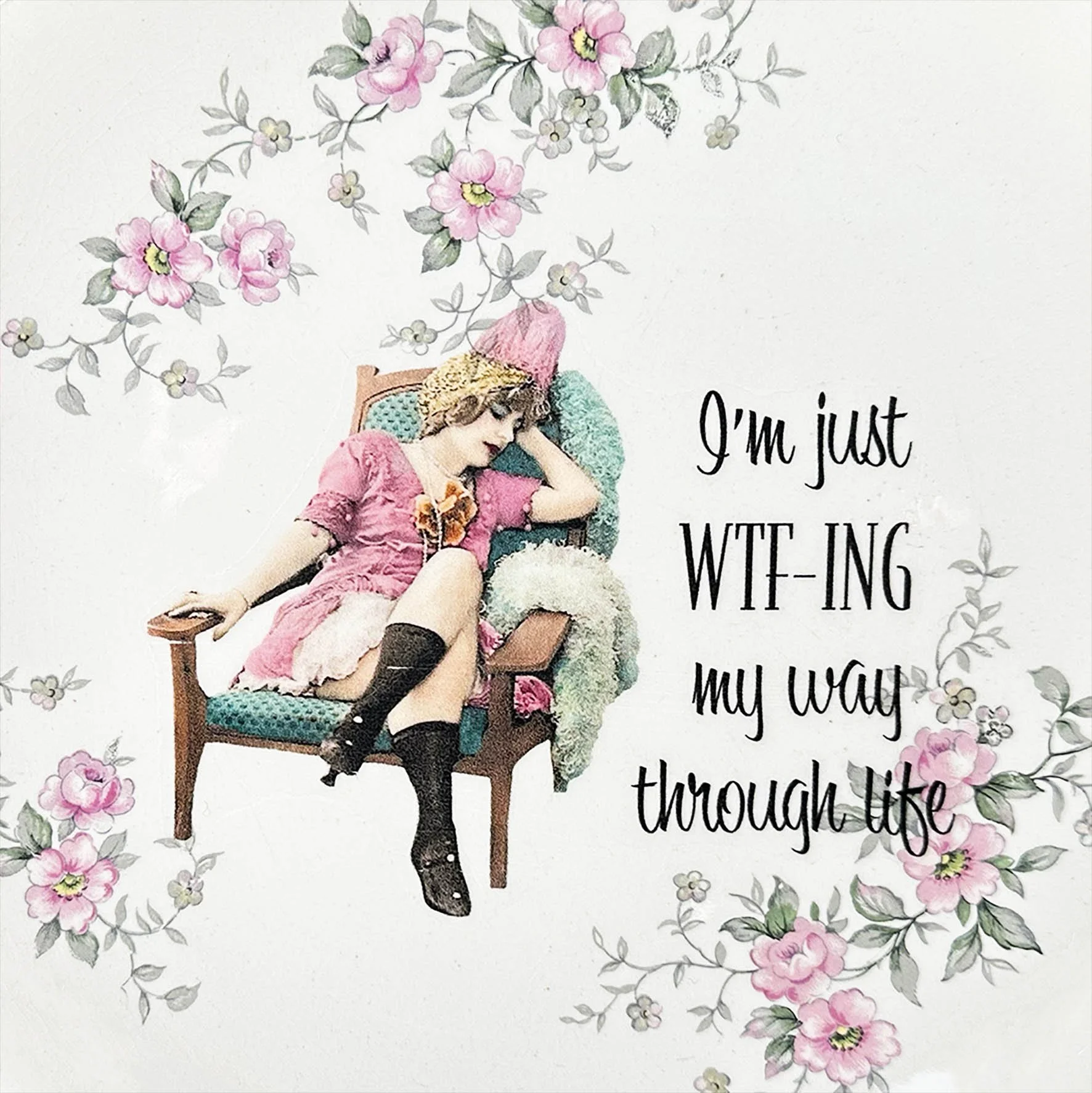 A vintage plate with the quote “I’m just WTF-ING my way through life”