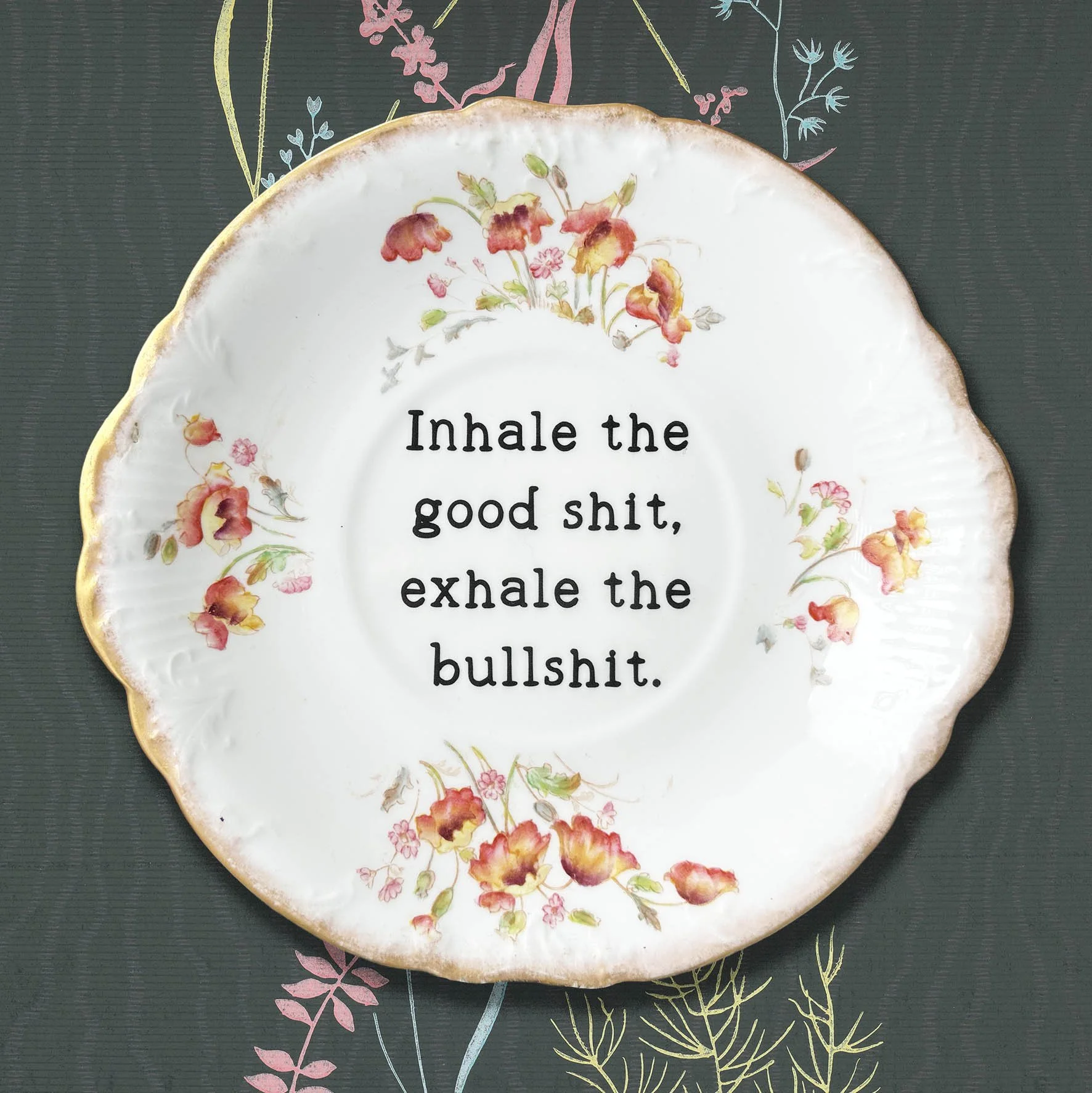 A vintage plate with a quote “inhale the good shit, exhale the bullshit”