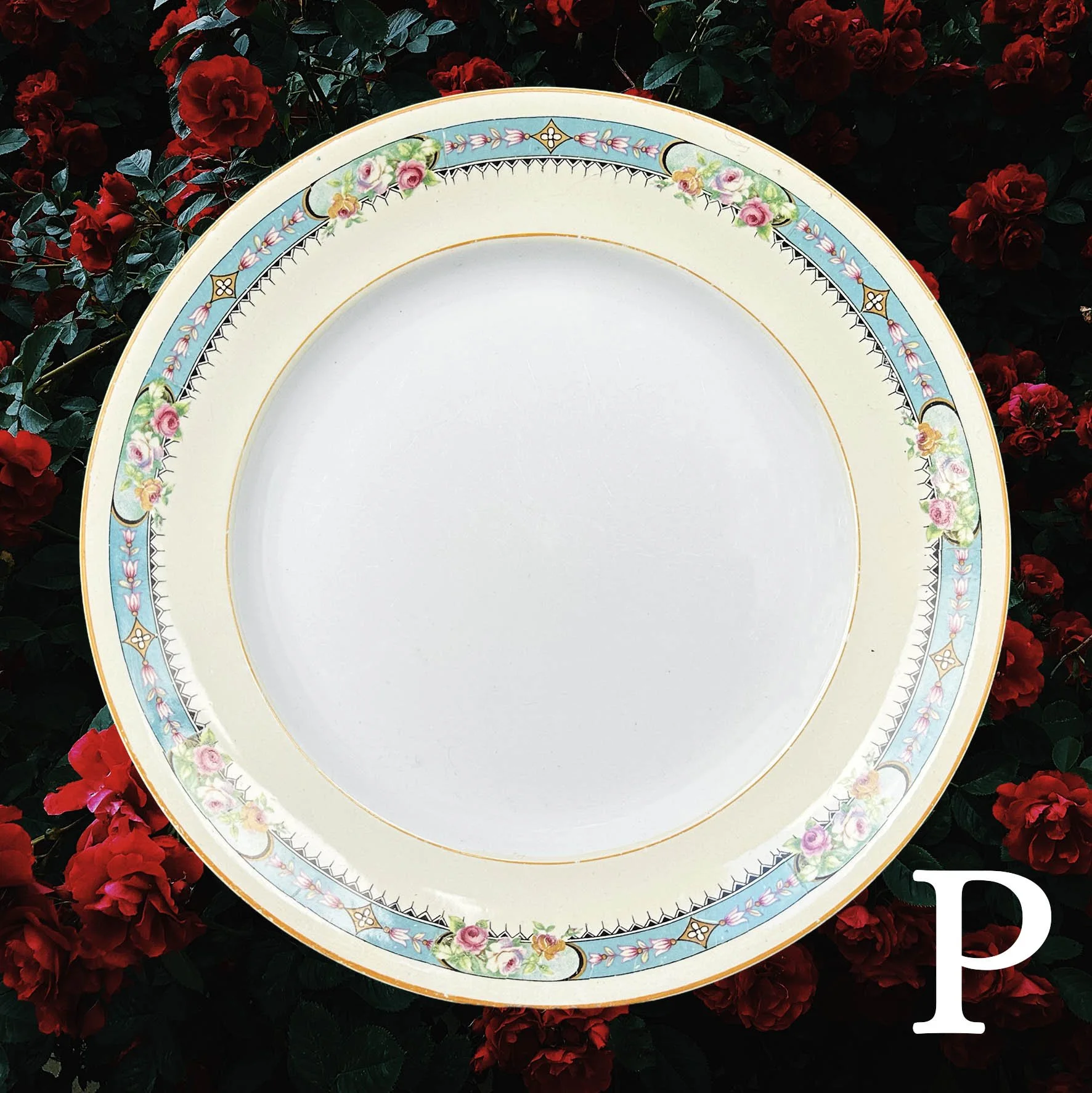 Plate P, vintage plate with a blue and pink floral border