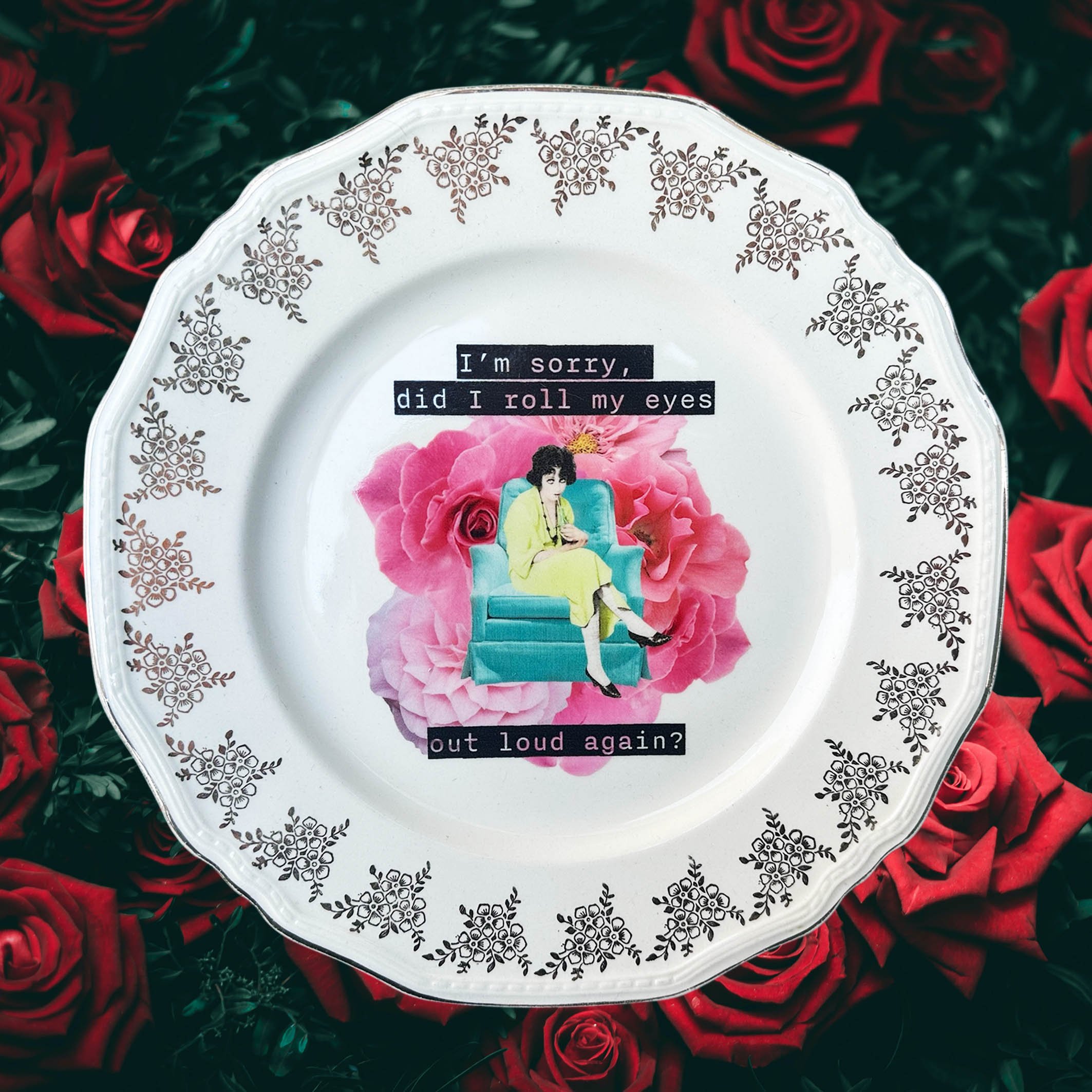 I’m sorry did I roll my eyes out loud again? Decorative wall plate, vintage plate with a floral border, an image of a woman sitting on a green chair rolling her eyes