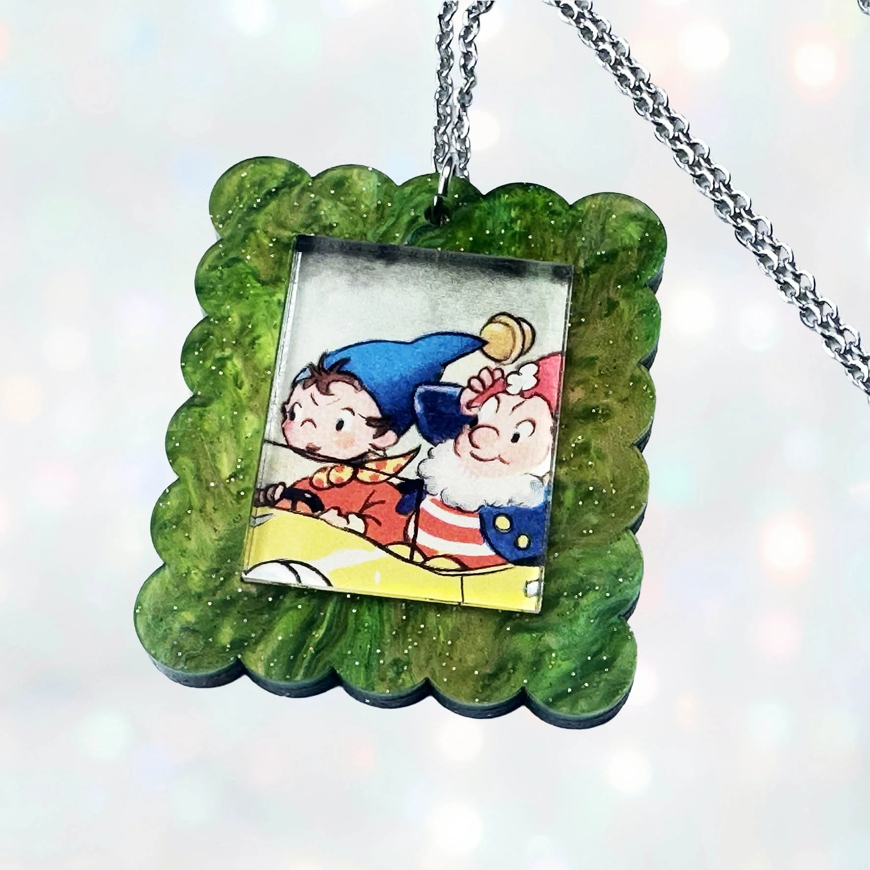 Green glitter acrylic rectangle necklace featuring a picture of Noddy