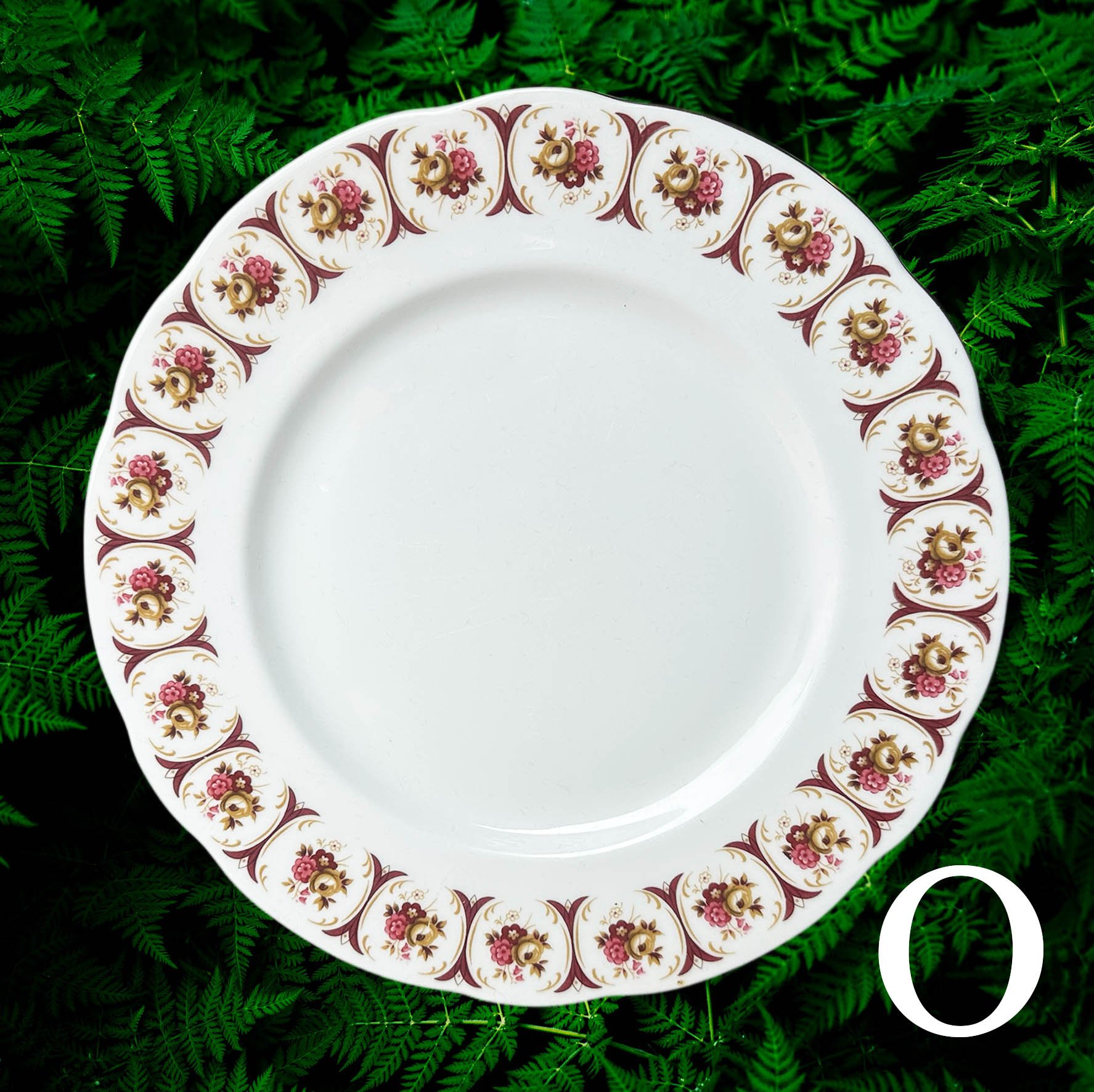 Plate O, purple and pink floral border design