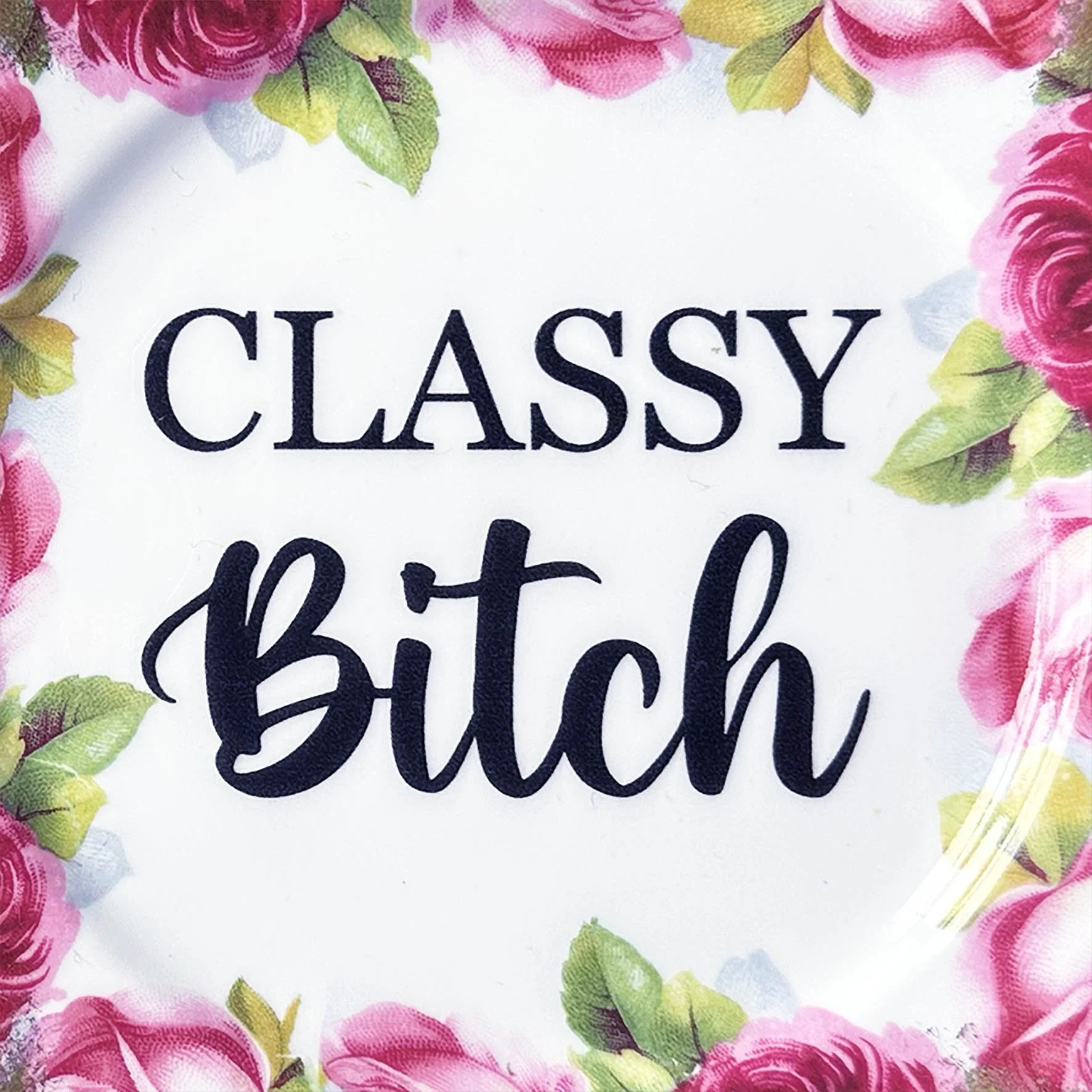 A vintage Royal Albert rose plate with a quote “classy bitch” with black lettering