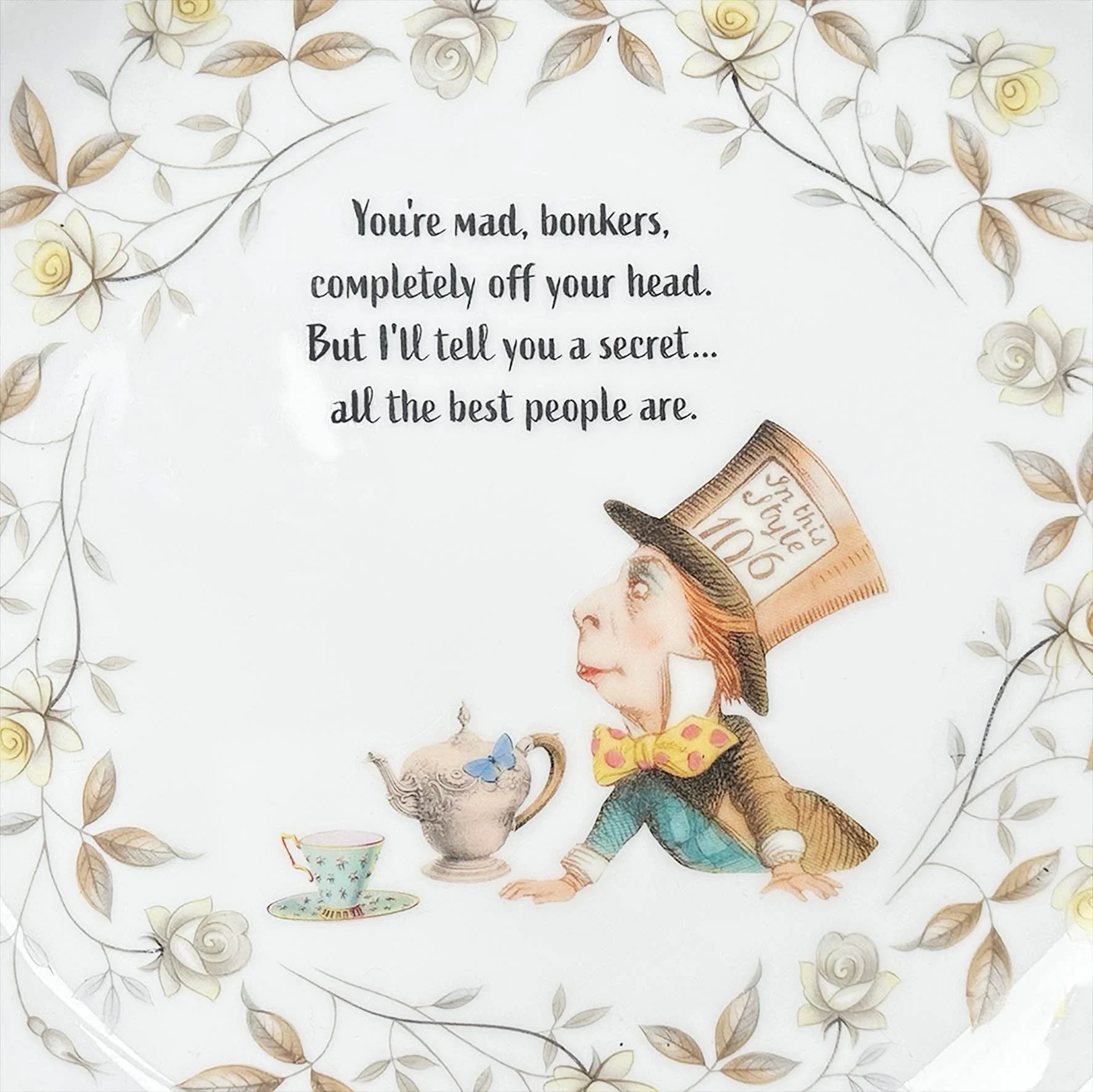 A vintage plate with a picture of the mad hatter and the quote “You’re mad, bonkers, completely off your head”