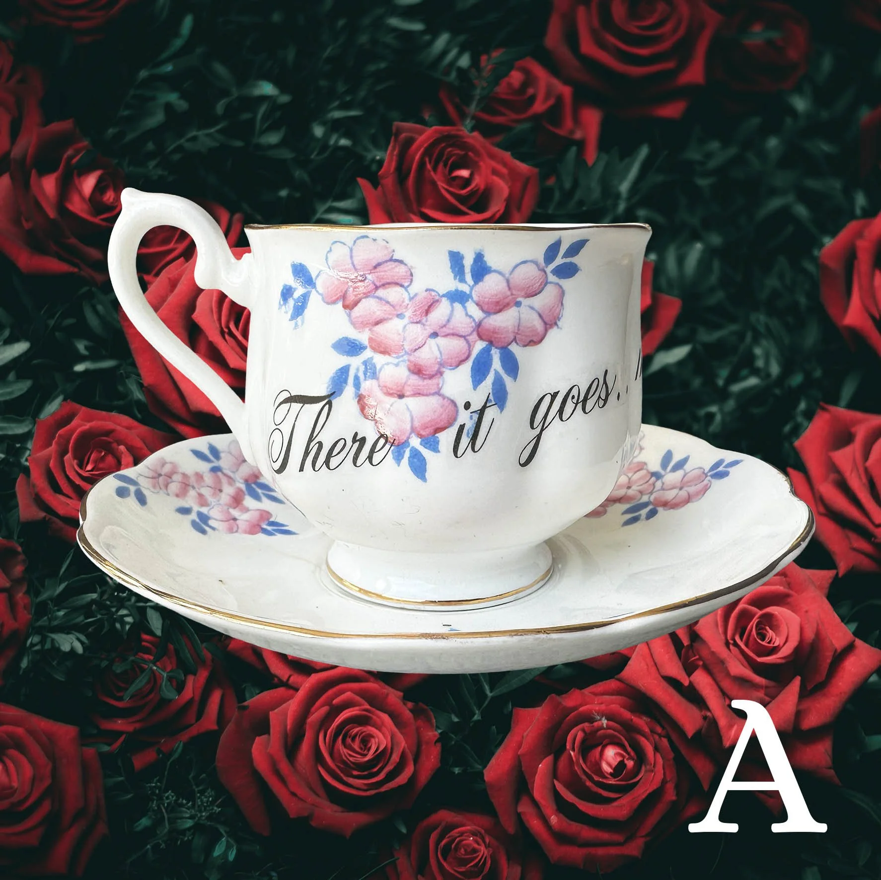 A vintage tea cup with a blue and pink floral design and the words "there it goes...my last flying fuck!"