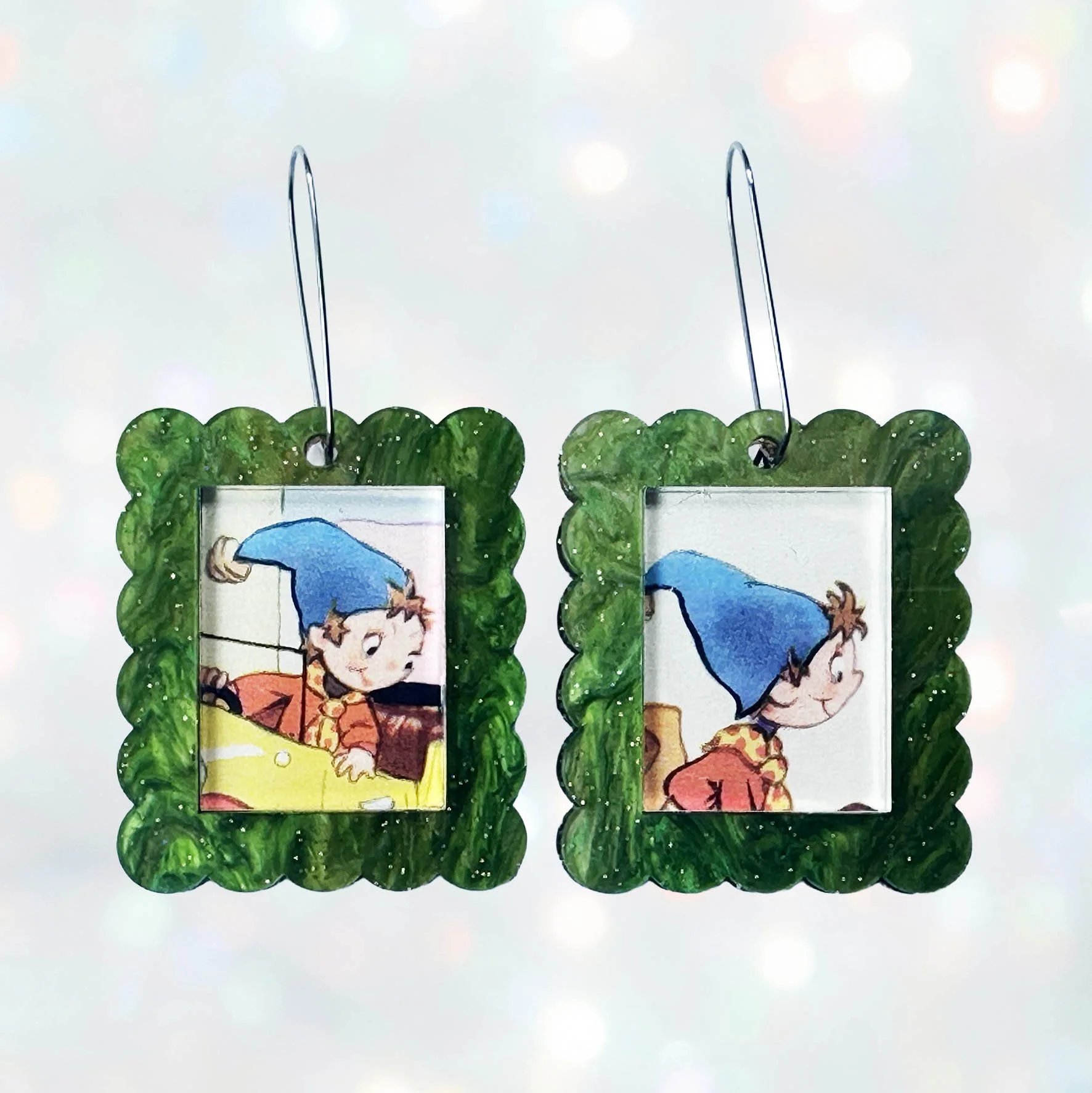 Green glitter acrylic rectangle earrings featuring a picture of Noddy