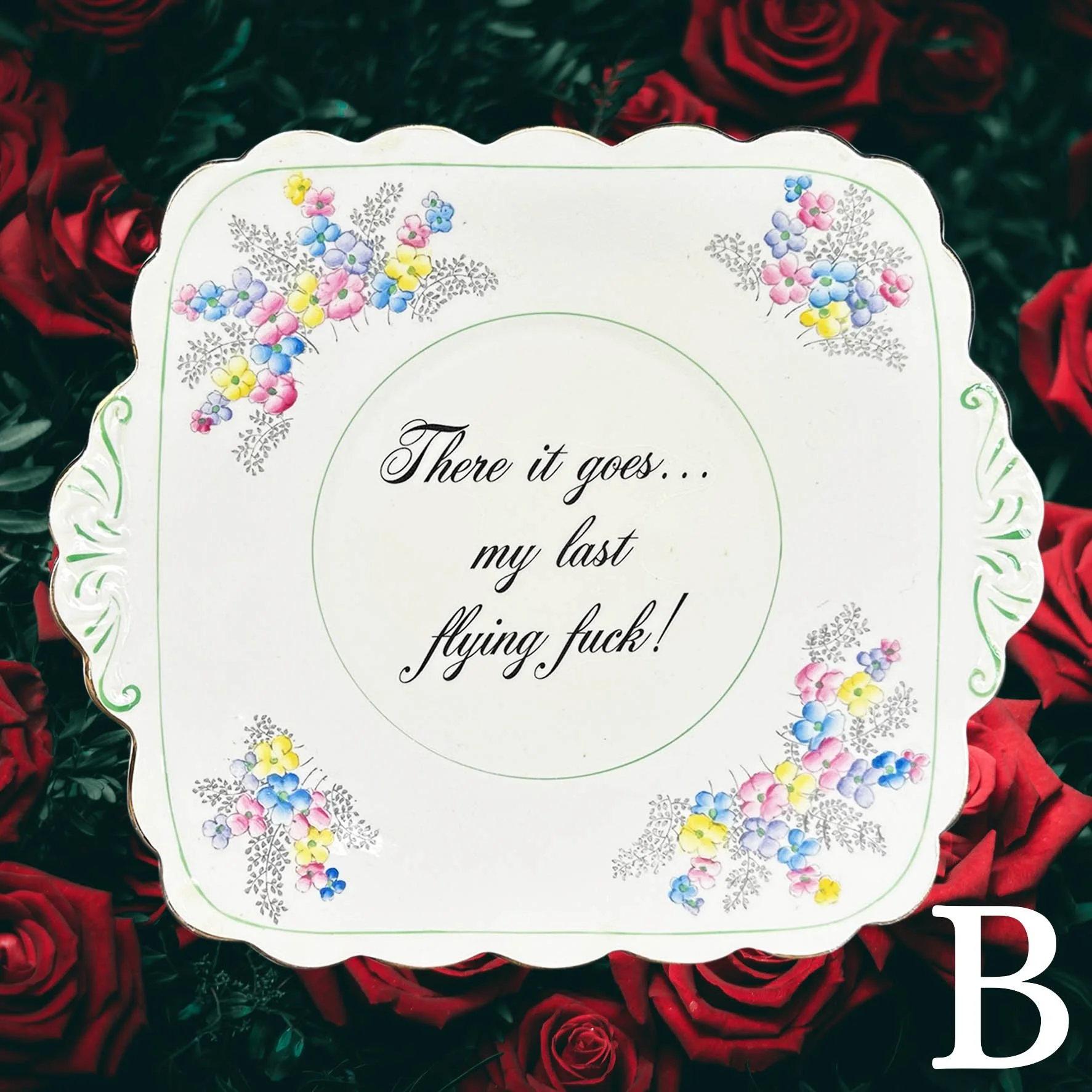 a decorative plate with the words "There it goes...my last flying fuck!"