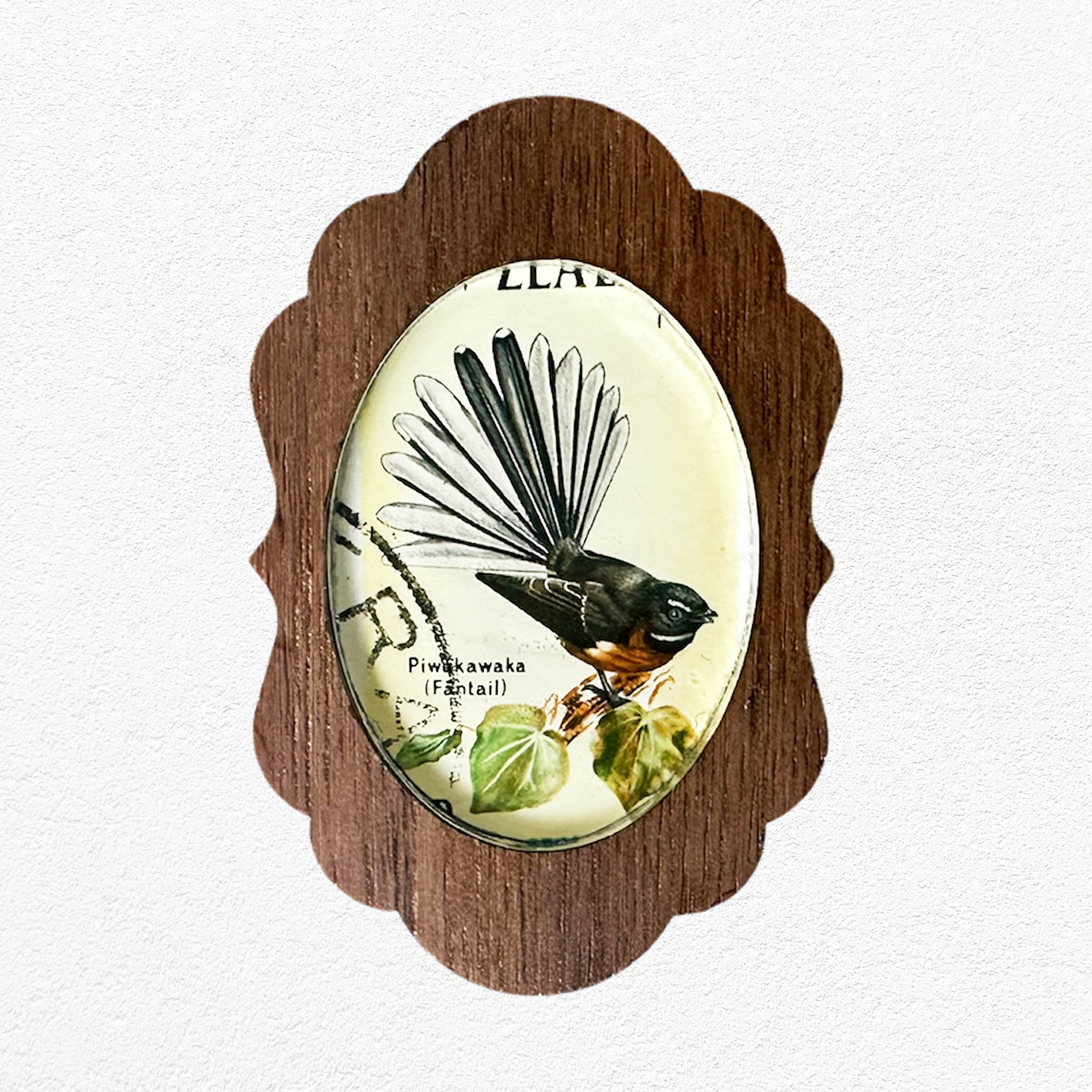 Stamp_brooch_oval_fantailA3.jpg
