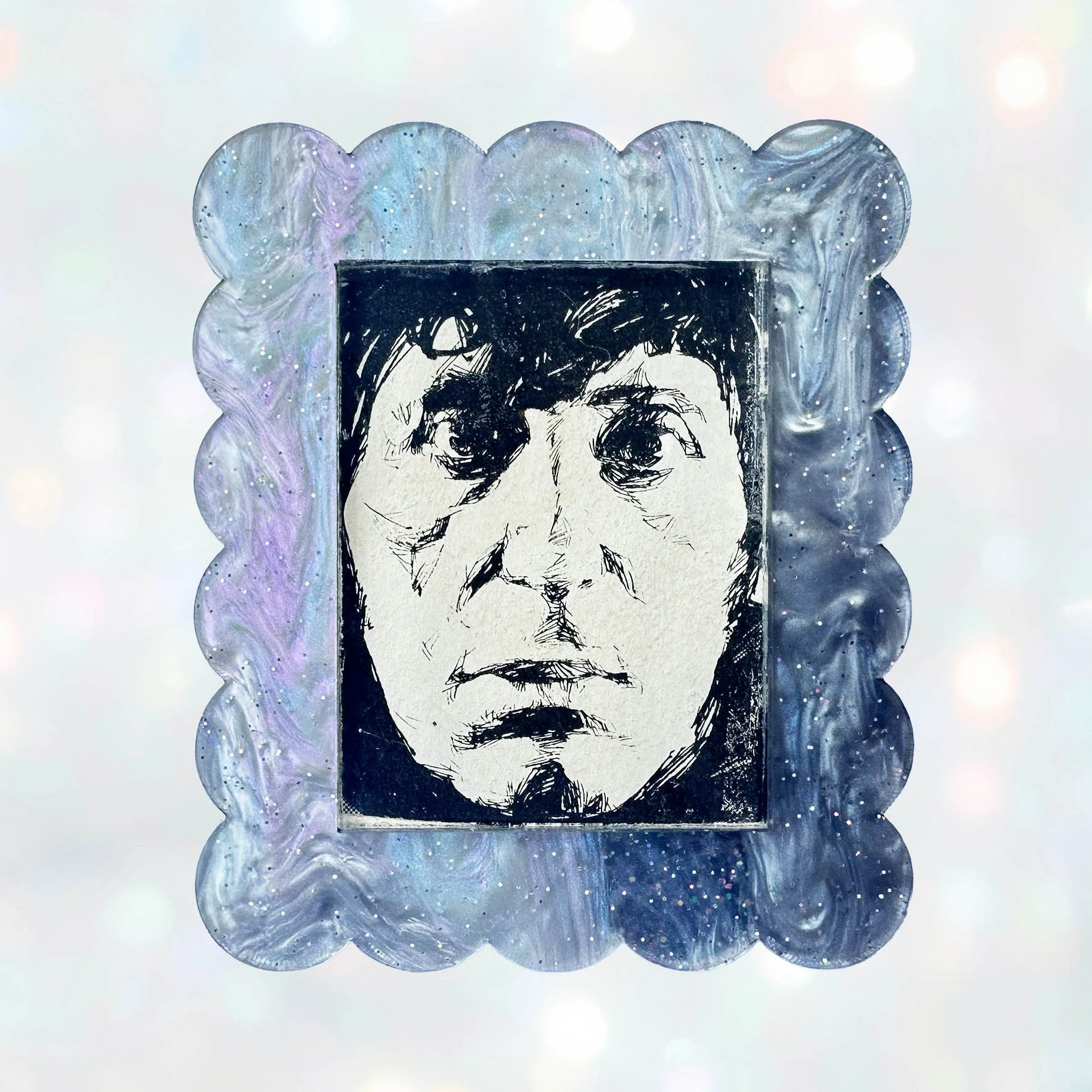 A blue purple glitter acrylic brooch featuring a picture of the 4th Doctor from Doctor Who