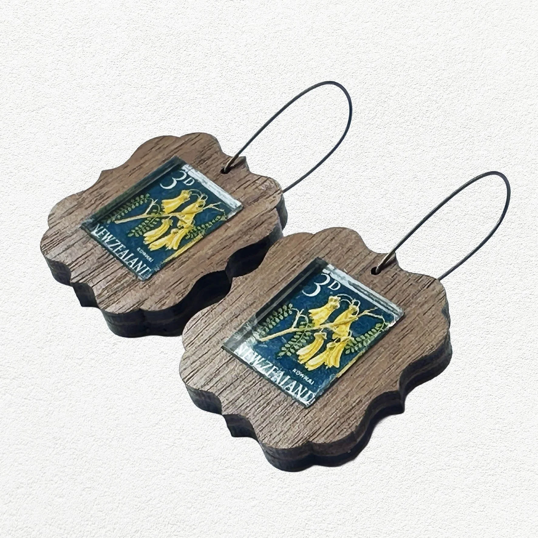 Wooden earrings featuring Kowhai New Zealand postage stamps