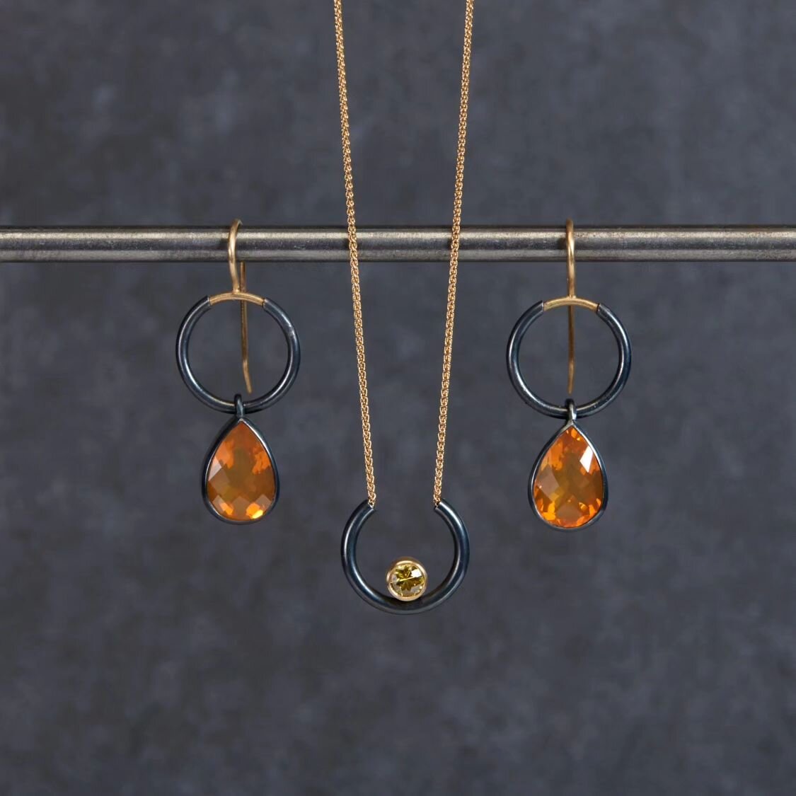 Still leaning in to my cosy vibes and trying to make the most of these darker, slower months. These honey tones just seem to hit the mark for me at this time of year, warming and luscious. Fire Opals and Yellow Sapphire here, arcs of oxidised silver 