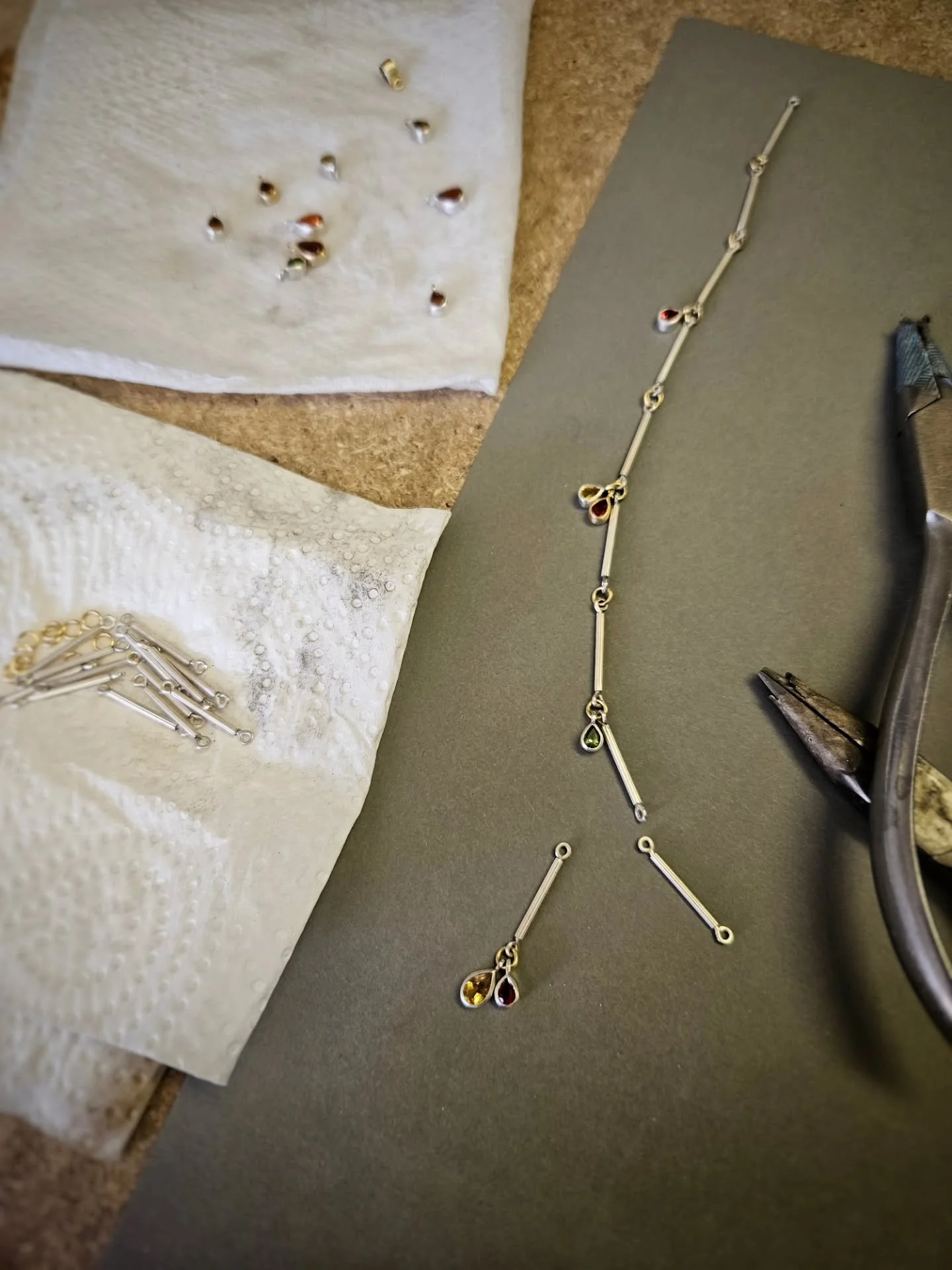 Laying out colours and finding the balance.

This commission is built around a palette that&rsquo;s personal to the client &mdash; stones chosen for their individual meaning and how they sit together.

I&rsquo;m drawn to the asymmetry and the slightl