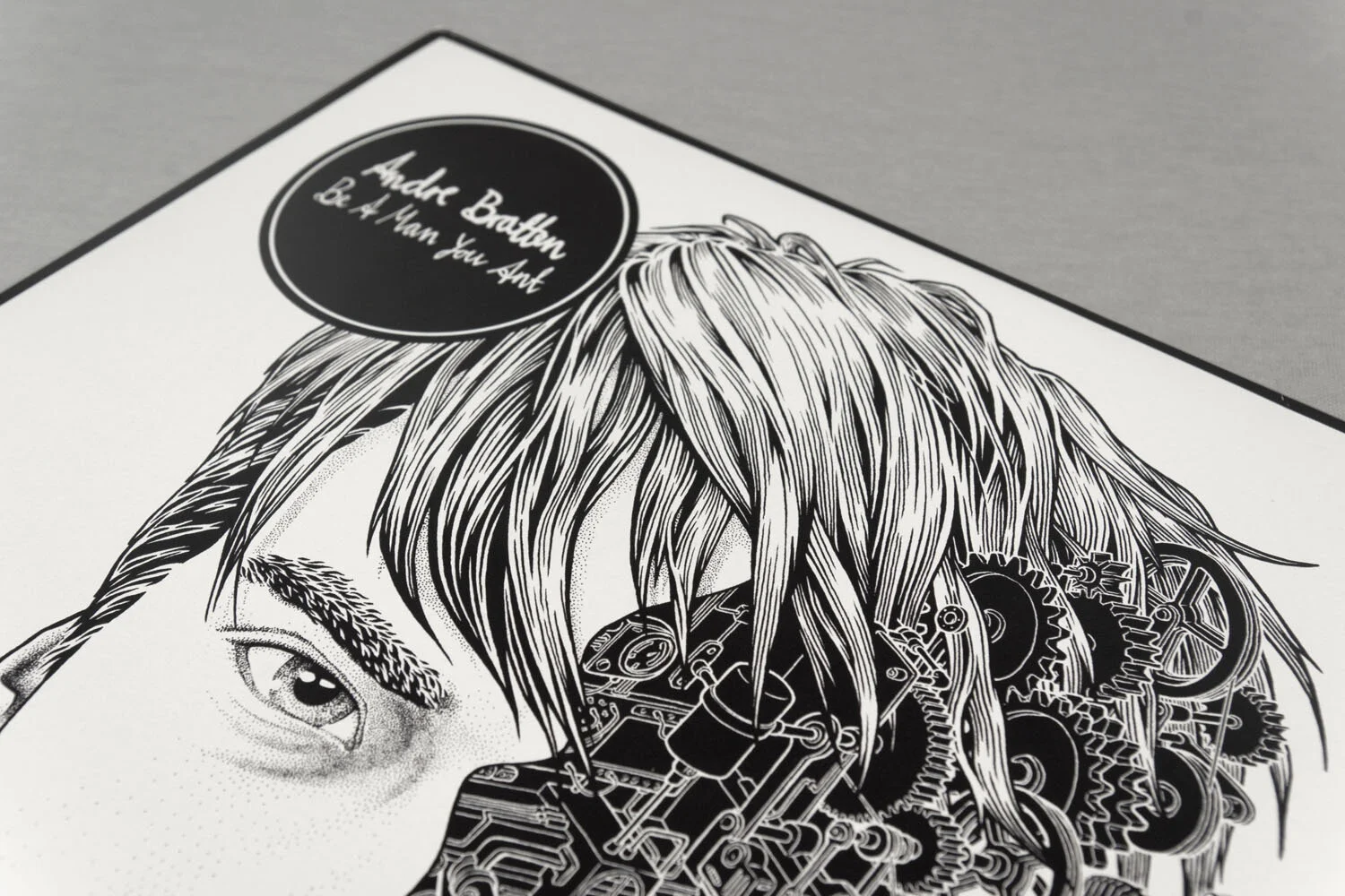 Black and white illustration of a person's face with partially covered eye, detailed hair, and mechanical gears integrated into the hair design. A black circle with white cursive text reads, 'Ander Bertain be & You, Ant.'