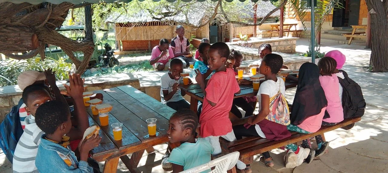 Children enjoy and relax over a glass of juice