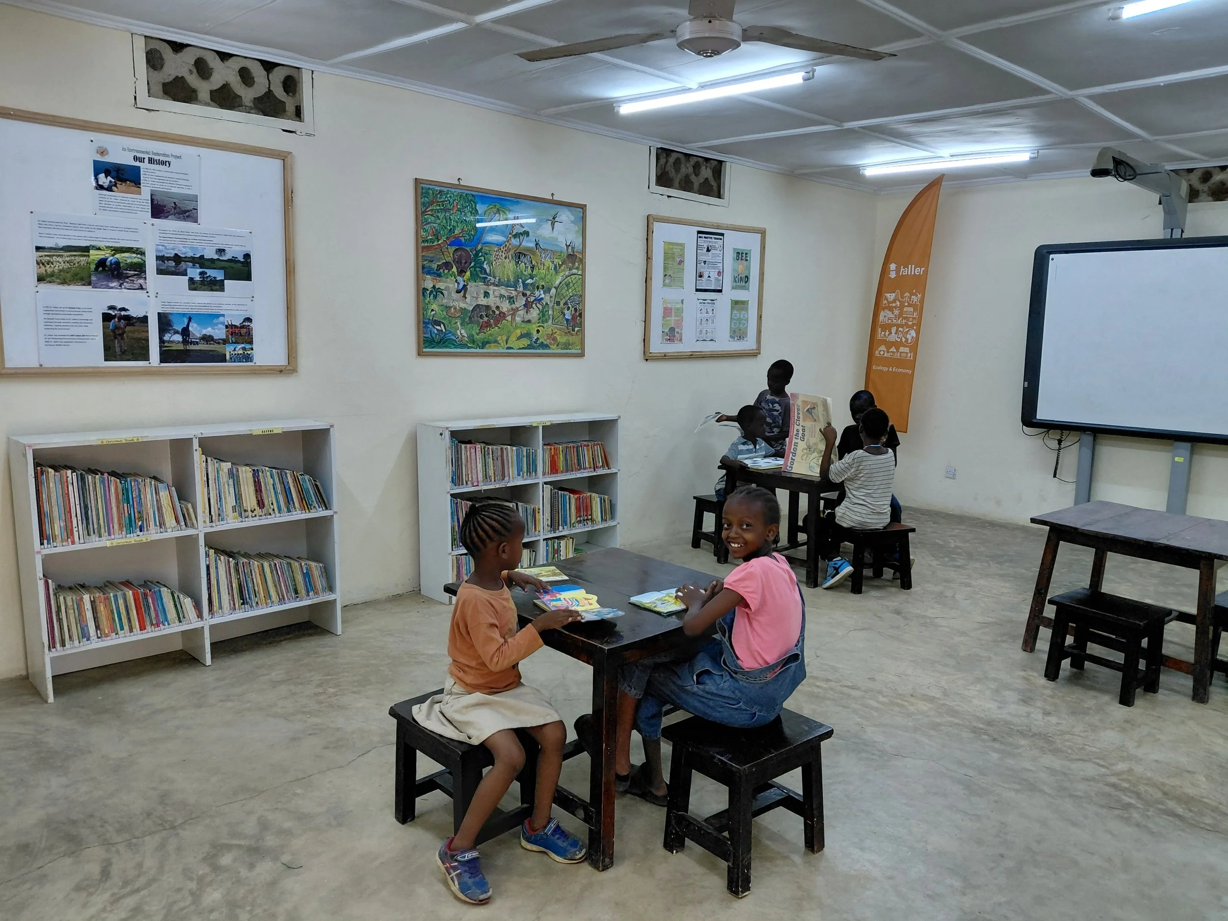 Kids enjoying quiet reading time in the children's room