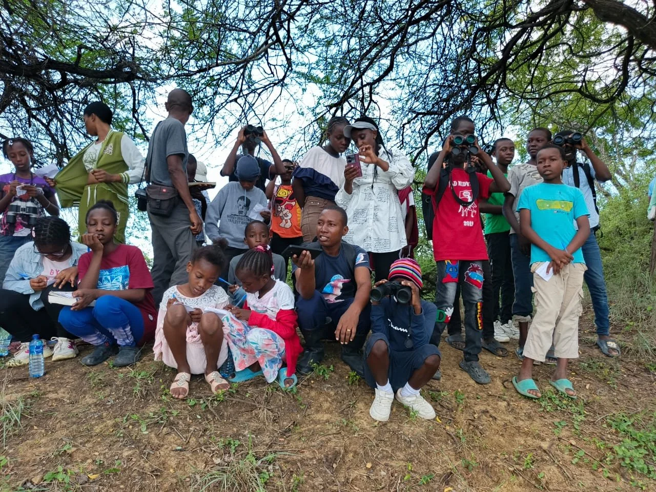 Group  of kids on a bird-watching tour