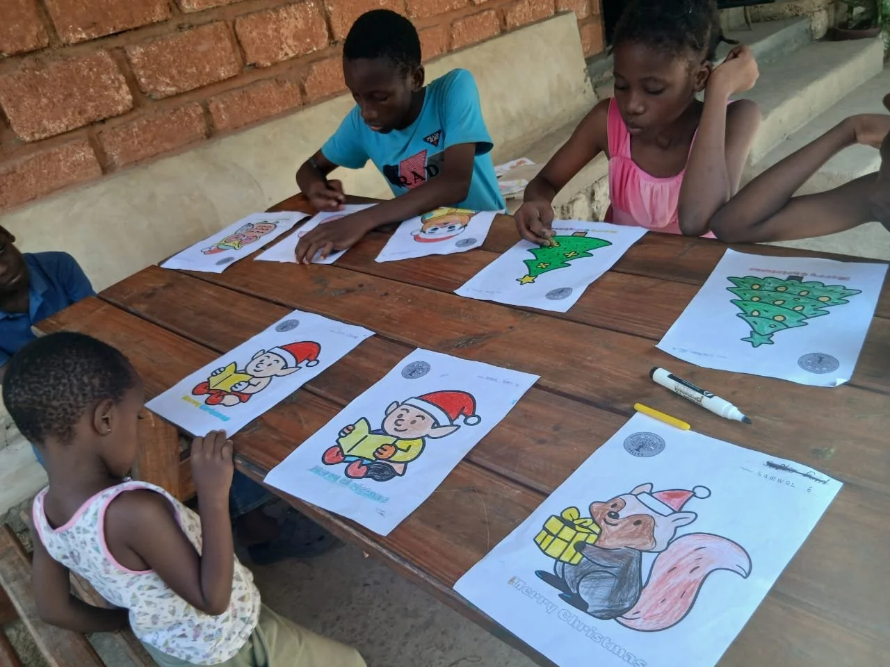 Children engage in Xmas Craft - coloring worksheets