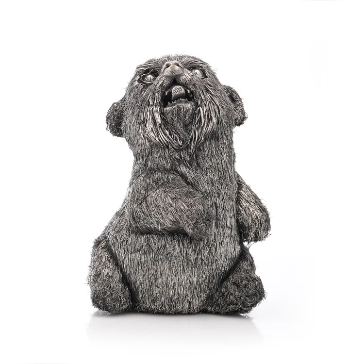 Mario Buccellati sterling silver furry cub model in a sitting pose
