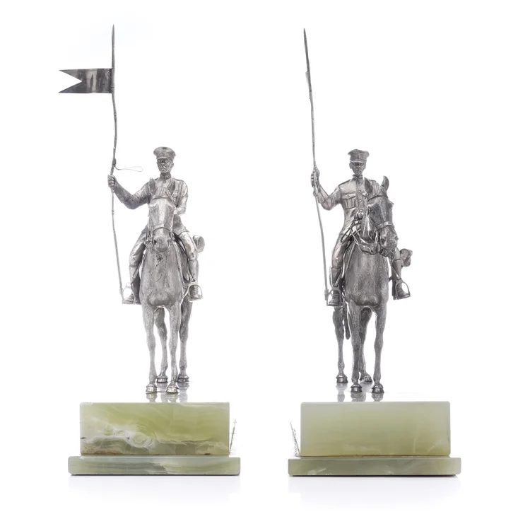 Asprey & Co. pair of horse-riding solid silver figurines on marble bases