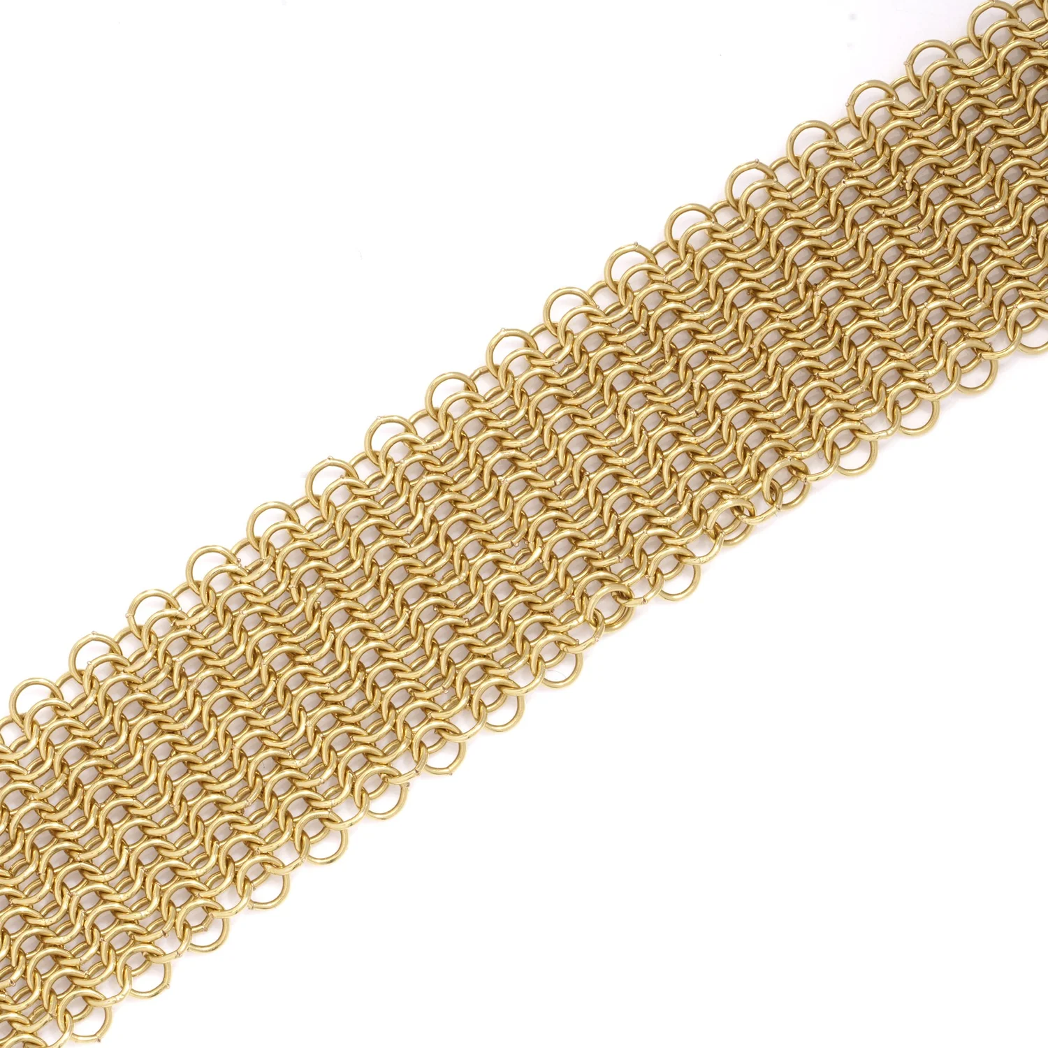 Close-up of finely woven 18KT gold mesh from an Elsa Peretti bracelet for Tiffany & Co.