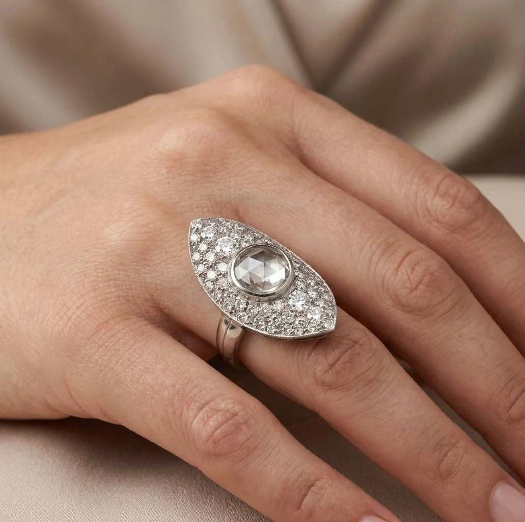 vintage-rose-cut-and-brilliant-cut-diamond-cluster-ring-model-Mozeris-Fine-Antiques.jpg