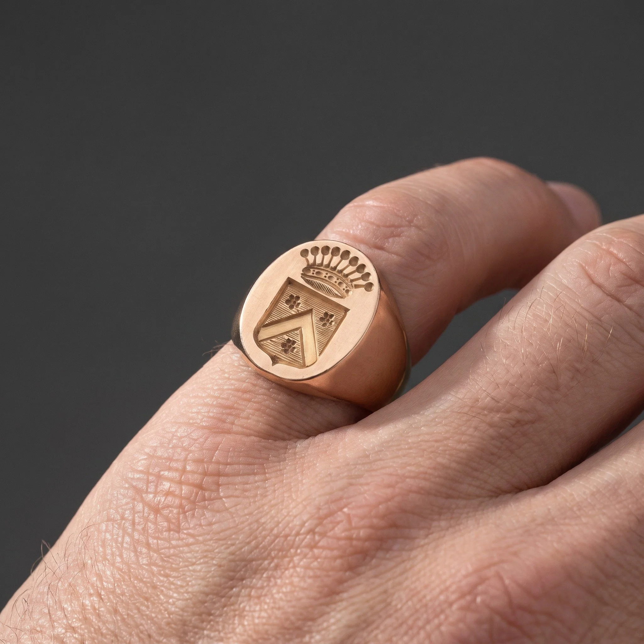 antique-french-18kt-gold-heraldic-signet-ring-coronet-coat-of-arms-02-worn-Mozeris-Fine-Antiques.jpg